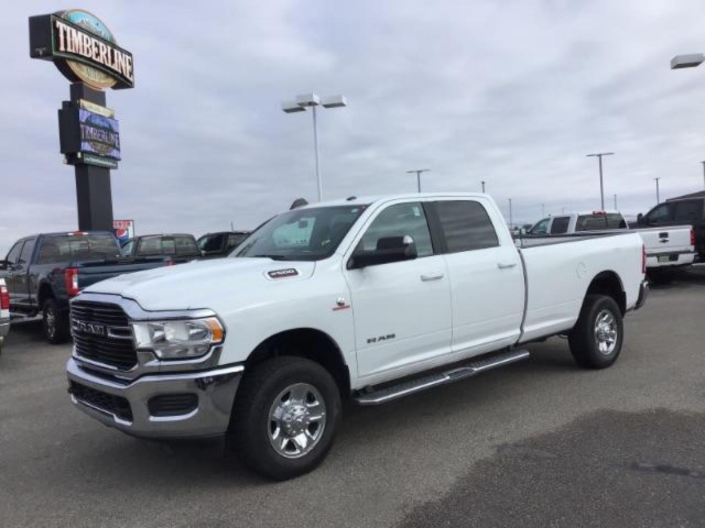 2021 Bright White Clear Coat /Black/Diesel Gray RAM 2500 Tradesman Crew Cab LWB 4WD (3C6UR5JL7MG) with an 6.7L L6 OHV 24V TURBO DIESEL engine, 6-Speed Automatic transmission, located at 1235 N Woodruff Ave., Idaho Falls, 83401, (208) 523-1053, 43.507172, -112.000488 - This 2021 Ram 2500 Bighorn 4x4, has the 6.7L diesel motor. It has 40,000 miles. It comes with cloth interior, integrated brake control, power windows and locks. At Timberline Auto it is always easy to find a great deal on your next vehicle! Our experienced sales staff can help find the right vehicle - Photo#0