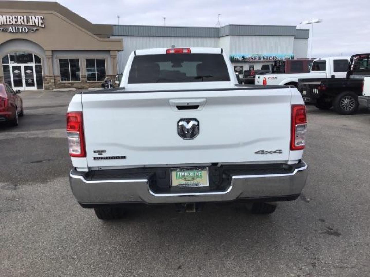 2021 Bright White Clear Coat /Black/Diesel Gray RAM 2500 Tradesman Crew Cab LWB 4WD (3C6UR5JL7MG) with an 6.7L L6 OHV 24V TURBO DIESEL engine, 6-Speed Automatic transmission, located at 1235 N Woodruff Ave., Idaho Falls, 83401, (208) 523-1053, 43.507172, -112.000488 - This 2021 Ram 2500 Bighorn 4x4, has the 6.7L diesel motor. It has 40,000 miles. It comes with cloth interior, integrated brake control, power windows and locks. At Timberline Auto it is always easy to find a great deal on your next vehicle! Our experienced sales staff can help find the right vehicle - Photo#3