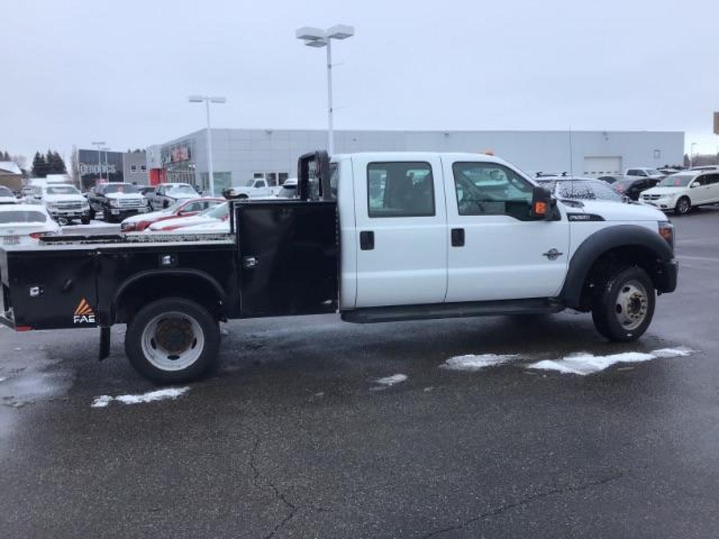 2016 WHITE /CLOTH Ford F-550 Crew Cab DRW 4WD (1FD0W5HT8GE) with an 6.7L V8 OHV 16V DIESEL engine, AUTOMATIC transmission, located at 1235 N Woodruff Ave., Idaho Falls, 83401, (208) 523-1053, 43.507172, -112.000488 - This 2016 Ford F550 4x4 XL, has the 6.7L Power stroke Diesel Motor. It has 113,000 miles. It is a local consignment. Comes with a flat bed, and all the compartments, to haul all of your tools. It has cloth interior, cruise control, blue tooth audio, and bench seat. At Timberline Auto it is always e - Photo#5