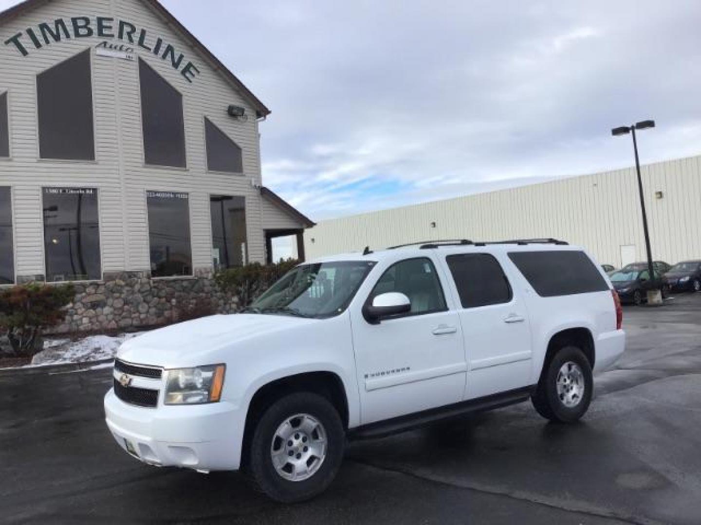 2007 Summit White Chevrolet Suburban LT1 1500 4WD (3GNFK16397G) with an 5.3L V8 OHV 16V FFV engine, 4-Speed Automatic transmission, located at 1235 N Woodruff Ave., Idaho Falls, 83401, (208) 523-1053, 43.507172, -112.000488 - At Timberline Auto it is always easy to find a great deal on your next vehicle! Our experienced sales staff can help find the right vehicle will fit your needs. Our knowledgeable finance department has options for almost any credit score. We offer many warranty contract options to protect you new pr - Photo#0