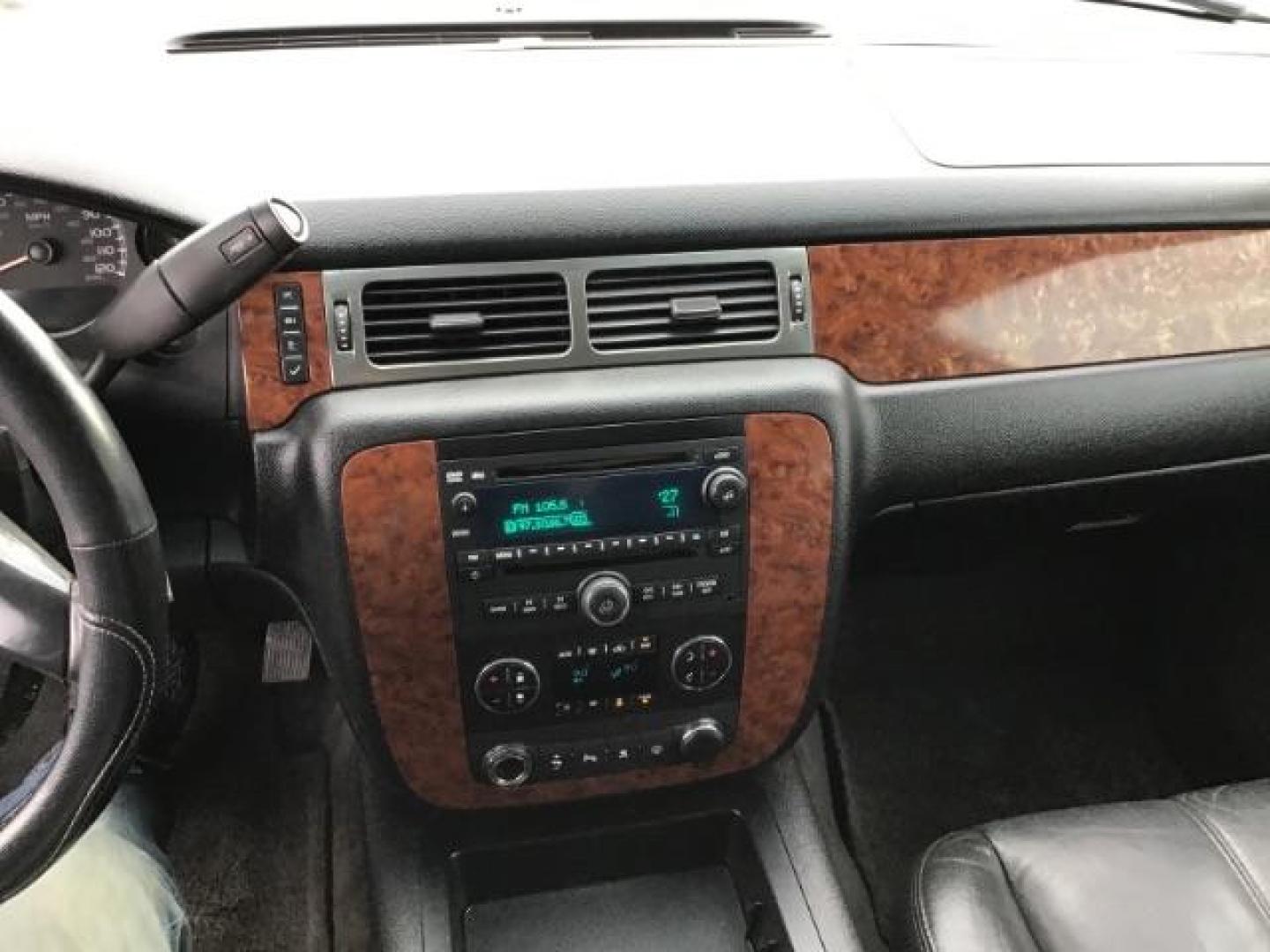 2007 Summit White Chevrolet Suburban LT1 1500 4WD (3GNFK16397G) with an 5.3L V8 OHV 16V FFV engine, 4-Speed Automatic transmission, located at 1235 N Woodruff Ave., Idaho Falls, 83401, (208) 523-1053, 43.507172, -112.000488 - At Timberline Auto it is always easy to find a great deal on your next vehicle! Our experienced sales staff can help find the right vehicle will fit your needs. Our knowledgeable finance department has options for almost any credit score. We offer many warranty contract options to protect you new pr - Photo#10