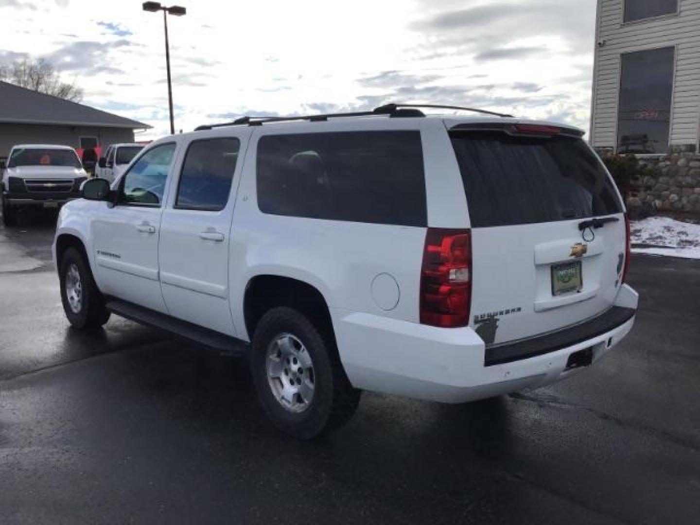 2007 Summit White Chevrolet Suburban LT1 1500 4WD (3GNFK16397G) with an 5.3L V8 OHV 16V FFV engine, 4-Speed Automatic transmission, located at 1235 N Woodruff Ave., Idaho Falls, 83401, (208) 523-1053, 43.507172, -112.000488 - At Timberline Auto it is always easy to find a great deal on your next vehicle! Our experienced sales staff can help find the right vehicle will fit your needs. Our knowledgeable finance department has options for almost any credit score. We offer many warranty contract options to protect you new pr - Photo#2