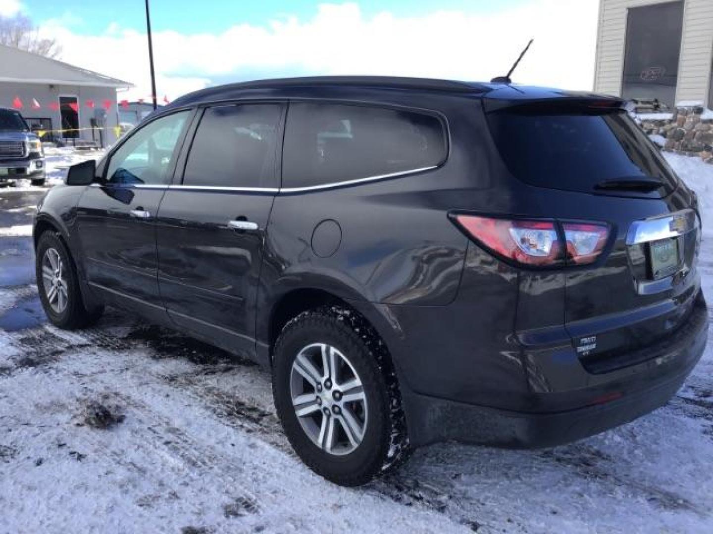 2015 GRAY /Ebony Chevrolet Traverse 2LT AWD (1GNKVHKD4FJ) with an 3.6L V6 DOHC 24V engine, 6-Speed Automatic transmission, located at 1235 N Woodruff Ave., Idaho Falls, 83401, (208) 523-1053, 43.507172, -112.000488 - This 2015 Chevrolet Traverse 2LT AWD, has 70,000 miles. Comes with leather interior, heated seats, back up camera, 3rd row seating, and touch screen stereo. At Timberline Auto it is always easy to find a great deal on your next vehicle! Our experienced sales staff can help find the right vehicle wil - Photo#2