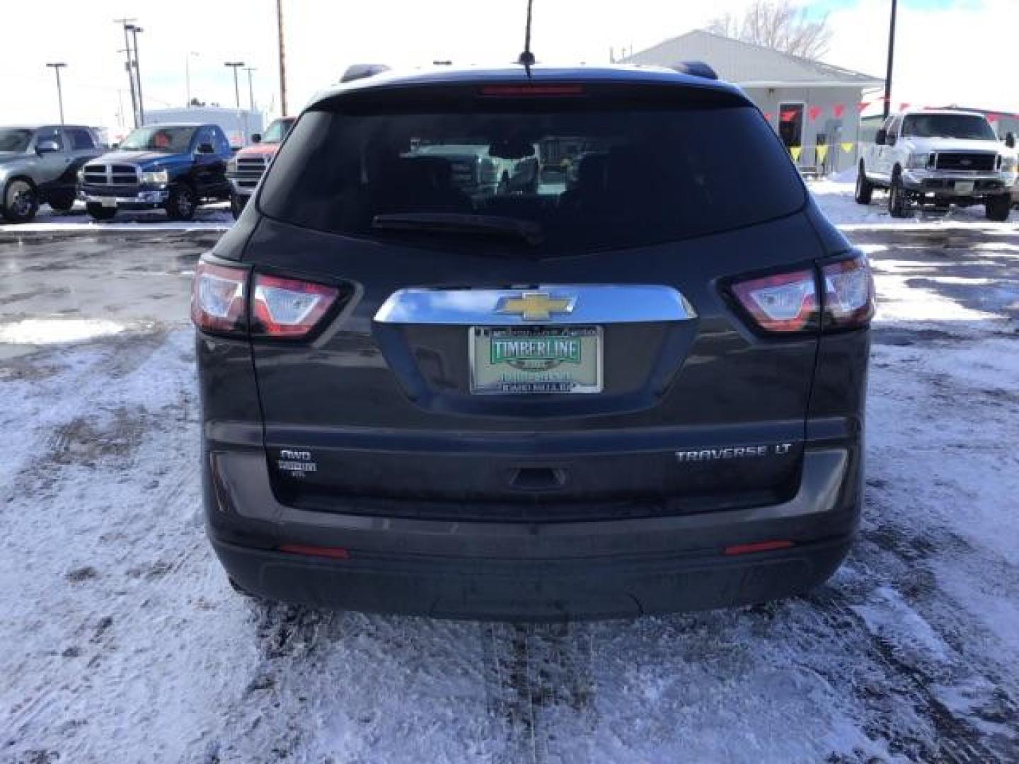 2015 GRAY /Ebony Chevrolet Traverse 2LT AWD (1GNKVHKD4FJ) with an 3.6L V6 DOHC 24V engine, 6-Speed Automatic transmission, located at 1235 N Woodruff Ave., Idaho Falls, 83401, (208) 523-1053, 43.507172, -112.000488 - This 2015 Chevrolet Traverse 2LT AWD, has 70,000 miles. Comes with leather interior, heated seats, back up camera, 3rd row seating, and touch screen stereo. At Timberline Auto it is always easy to find a great deal on your next vehicle! Our experienced sales staff can help find the right vehicle wil - Photo#3