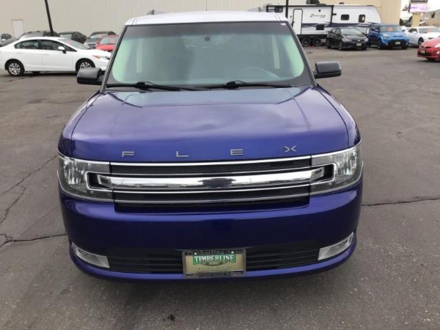 2013 Deep Impact Blue Metallic /Charcoal Black Leather Interior Ford Flex SEL FWD (2FMGK5C88DB) with an 3.5L V6 DOHC 24V engine, 6-Speed Automatic Overdrive transmission, located at 1235 N Woodruff Ave., Idaho Falls, 83401, (208) 523-1053, 43.507172, -112.000488 - This 2013 Ford Flex SEL FWD, has 164,000 miles. Comes with leather interior, heated seats, blue tooth audio, 3rd row seating, power seats, cruise control, and power windows and locks. At Timberline Auto it is always easy to find a great deal on your next vehicle! Our experienced sales staff can help - Photo#7