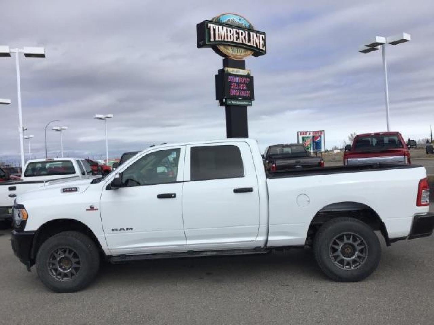 2019 Bright White Clear Coat /Black/Diesel Gray, vinyl RAM 2500 Tradesman Crew Cab SWB 4WD (3C6UR5CL4KG) with an 6.7L L6 OHV 24V TURBO DIESEL engine, 6-Speed Automatic transmission, located at 1235 N Woodruff Ave., Idaho Falls, 83401, (208) 523-1053, 43.507172, -112.000488 - This 2019 Ram 2500 Tradesman 4x4, has the 6.7L cummins motor. It has 75,000 miles. It comes with cloth interior, integrated brake control, touch screen stereo, blue tooth audio, cruise control, and power windows. At Timberline Auto it is always easy to find a great deal on your next vehicle! Our e - Photo#1