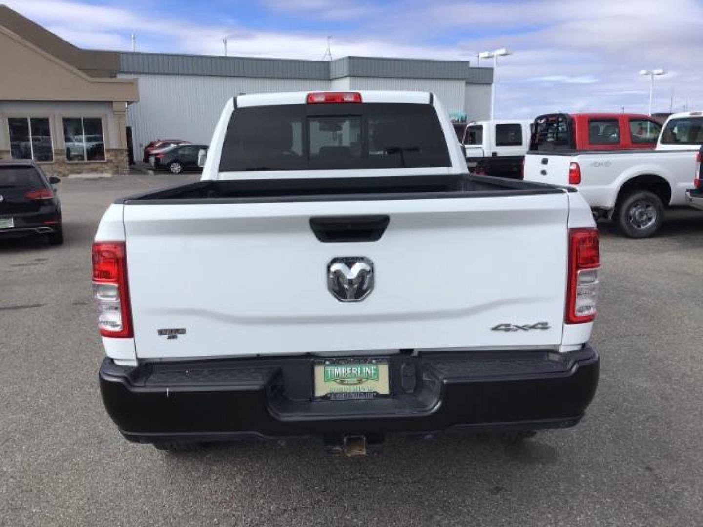 2019 Bright White Clear Coat /Black/Diesel Gray, vinyl RAM 2500 Tradesman Crew Cab SWB 4WD (3C6UR5CL4KG) with an 6.7L L6 OHV 24V TURBO DIESEL engine, 6-Speed Automatic transmission, located at 1235 N Woodruff Ave., Idaho Falls, 83401, (208) 523-1053, 43.507172, -112.000488 - This 2019 Ram 2500 Tradesman 4x4, has the 6.7L cummins motor. It has 75,000 miles. It comes with cloth interior, integrated brake control, touch screen stereo, blue tooth audio, cruise control, and power windows. At Timberline Auto it is always easy to find a great deal on your next vehicle! Our e - Photo#3