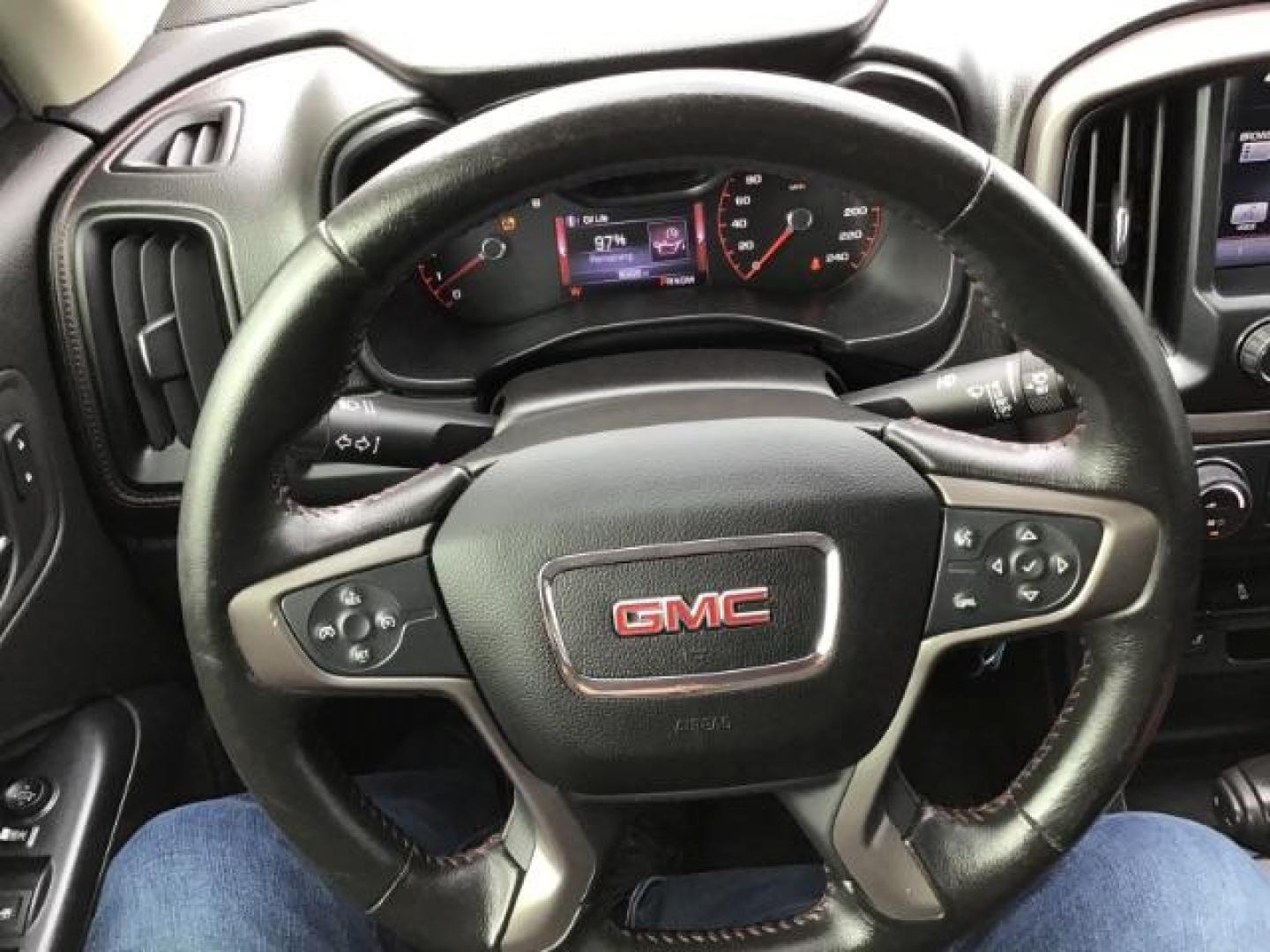 2015 Cardinal Red /Jet Black GMC Canyon SLE Crew Cab 4WD Short Box (1GTG6BE31F1) with an 3.6L V6 DOHC 24V engine, 6-Speed Automatic transmission, located at 1235 N Woodruff Ave., Idaho Falls, 83401, (208) 523-1053, 43.507172, -112.000488 - This 2015 GMC Canyon SLT 4x4, has 90,000 miles. Comes with leather interior, heated seats, Bose sound, back up camera, and spray in bed liner. At Timberline Auto it is always easy to find a great deal on your next vehicle! Our experienced sales staff can help find the right vehicle that will fit you - Photo#14