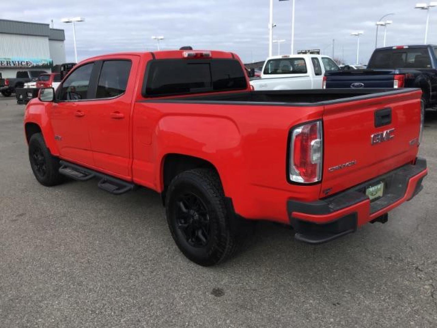 2015 Cardinal Red /Jet Black GMC Canyon SLE Crew Cab 4WD Short Box (1GTG6BE31F1) with an 3.6L V6 DOHC 24V engine, 6-Speed Automatic transmission, located at 1235 N Woodruff Ave., Idaho Falls, 83401, (208) 523-1053, 43.507172, -112.000488 - This 2015 GMC Canyon SLT 4x4, has 90,000 miles. Comes with leather interior, heated seats, Bose sound, back up camera, and spray in bed liner. At Timberline Auto it is always easy to find a great deal on your next vehicle! Our experienced sales staff can help find the right vehicle that will fit you - Photo#2