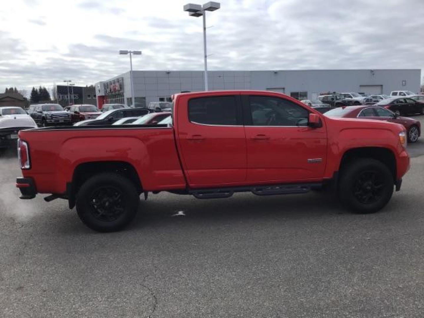 2015 Cardinal Red /Jet Black GMC Canyon SLE Crew Cab 4WD Short Box (1GTG6BE31F1) with an 3.6L V6 DOHC 24V engine, 6-Speed Automatic transmission, located at 1235 N Woodruff Ave., Idaho Falls, 83401, (208) 523-1053, 43.507172, -112.000488 - This 2015 GMC Canyon SLT 4x4, has 90,000 miles. Comes with leather interior, heated seats, Bose sound, back up camera, and spray in bed liner. At Timberline Auto it is always easy to find a great deal on your next vehicle! Our experienced sales staff can help find the right vehicle that will fit you - Photo#5