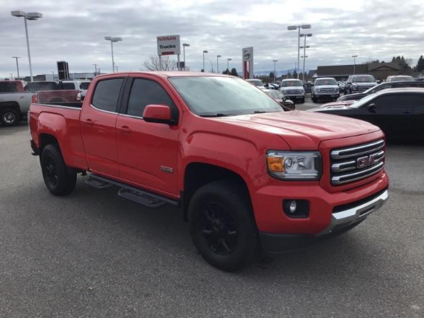 2015 Cardinal Red /Jet Black GMC Canyon SLE Crew Cab 4WD Short Box (1GTG6BE31F1) with an 3.6L V6 DOHC 24V engine, 6-Speed Automatic transmission, located at 1235 N Woodruff Ave., Idaho Falls, 83401, (208) 523-1053, 43.507172, -112.000488 - This 2015 GMC Canyon SLT 4x4, has 90,000 miles. Comes with leather interior, heated seats, Bose sound, back up camera, and spray in bed liner. At Timberline Auto it is always easy to find a great deal on your next vehicle! Our experienced sales staff can help find the right vehicle that will fit you - Photo#6