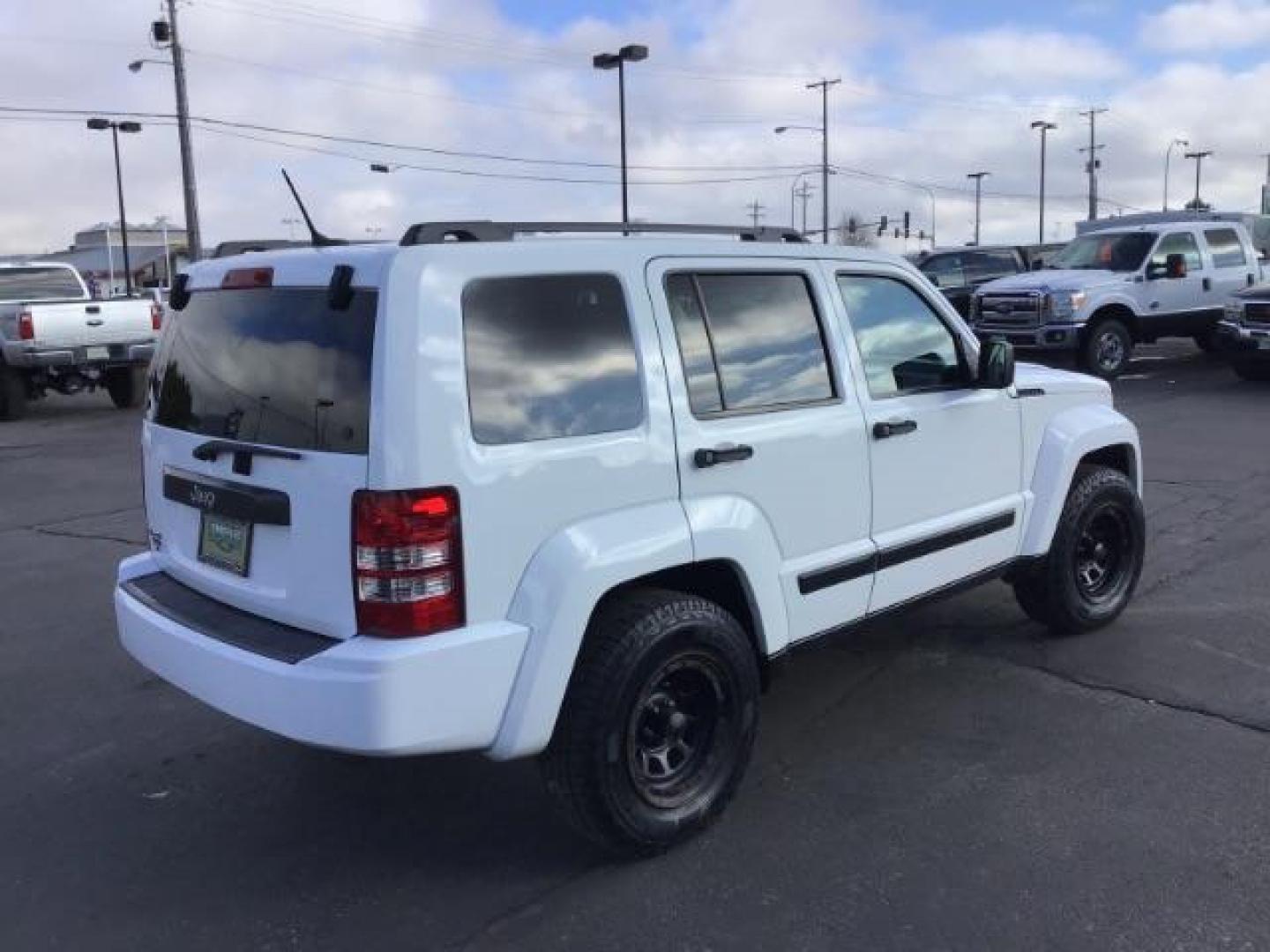 2012 Jeep Liberty Sport 4WD (1C4PJMAK0CW) with an 3.7L V6 SOHC 12V engine, 4-Speed Automatic transmission, located at 1235 N Woodruff Ave., Idaho Falls, 83401, (208) 523-1053, 43.507172, -112.000488 - This 2012 Jeep Liberty Sport 4x4, has 98,000 miles. Comes with cloth interior, power windows and locks, cruise control, and AM /FM CD stereo. At Timberline Auto it is always easy to find a great deal on your next vehicle! Our experienced sales staff can help find the right vehicle will fit your need - Photo#4