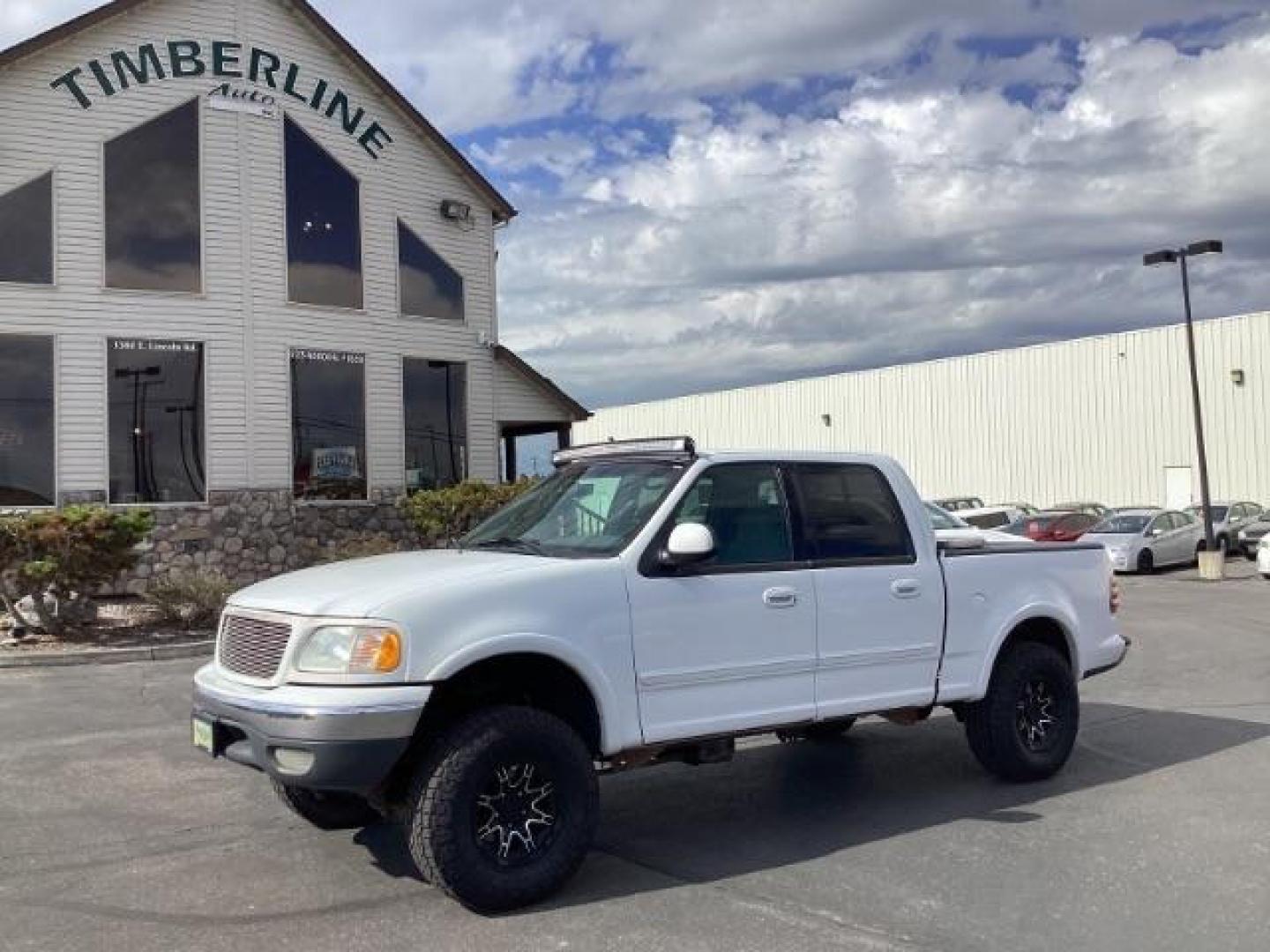 2001 WHITE /Medium Graphite Cloth Ford F-150 XLT SuperCrew 4WD (1FTRW08L51K) with an 5.4L V8 SOHC 16V engine, 4-Speed Automatic transmission, located at 1235 N Woodruff Ave., Idaho Falls, 83401, (208) 523-1053, 43.507172, -112.000488 - The 2001 Ford F-150 XLT 4x4 SuperCrew typically offers a range of features suitable for both work and everyday use. Here are some key features you can typically find in the 2001 Ford F-150 XLT 4x4 SuperCrew: Engine Options: The 2001 F-150 XLT SuperCrew usually offers a choice of engine options: 4. - Photo#1