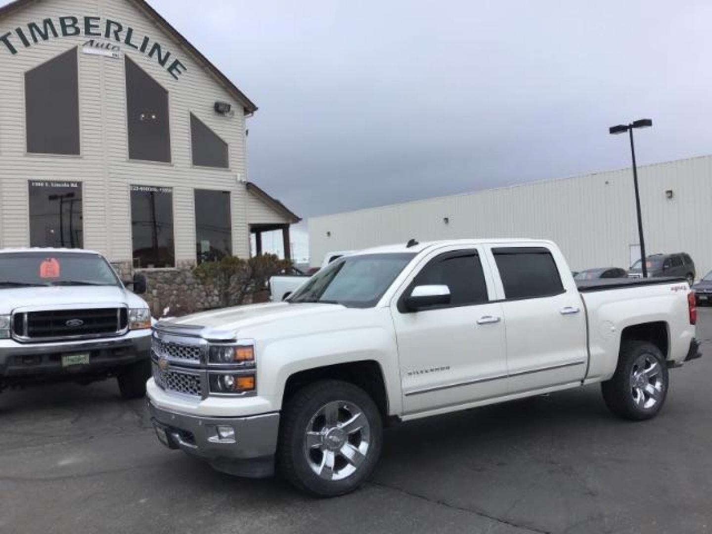 2014 White Diamond Tricoat /Jet Black Chevrolet Silverado 1500 LTZ CREWCAB (3GCUKSEC2EG) with an 5.3L V8 OHV 16V engine, 6-Speed Automatic transmission, located at 1235 N Woodruff Ave., Idaho Falls, 83401, (208) 523-1053, 43.507172, -112.000488 - This 2014 Chevrolet 1500 LTZ 4x4, has the 5.3L motor. It has 117,000 miles. It comes with leather interior, heated seats, blue tooth audio, back up camera, Bose sound system, power seats, and power windows and locks. At Timberline Auto it is always easy to find a great deal on your next vehicle! Our - Photo#0