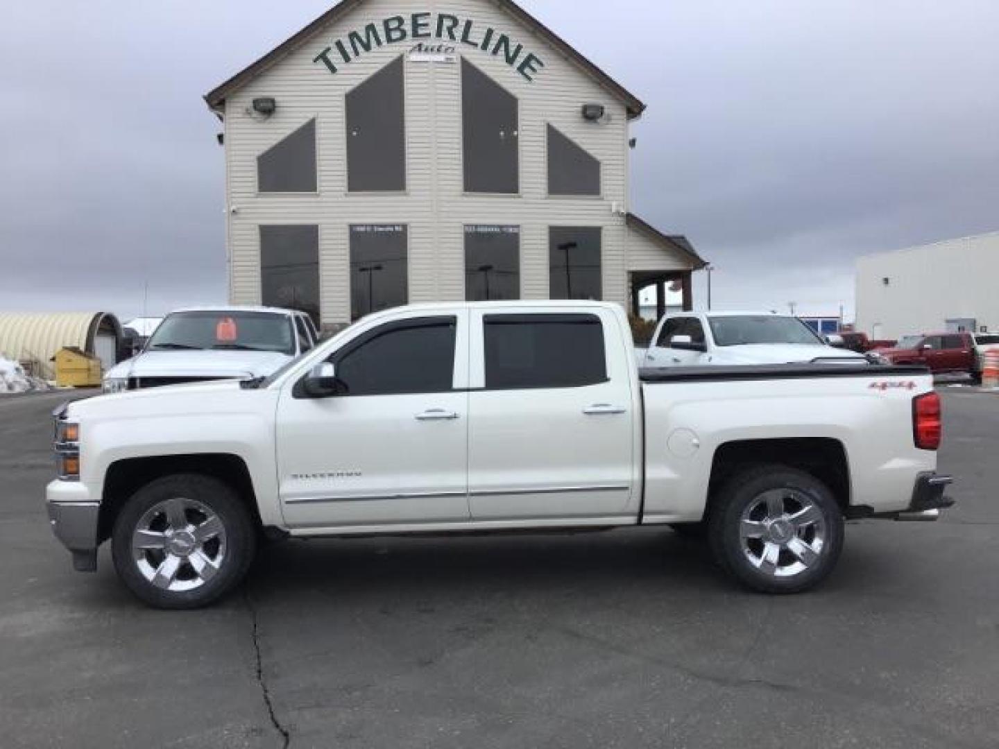 2014 White Diamond Tricoat /Jet Black Chevrolet Silverado 1500 LTZ CREWCAB (3GCUKSEC2EG) with an 5.3L V8 OHV 16V engine, 6-Speed Automatic transmission, located at 1235 N Woodruff Ave., Idaho Falls, 83401, (208) 523-1053, 43.507172, -112.000488 - This 2014 Chevrolet 1500 LTZ 4x4, has the 5.3L motor. It has 117,000 miles. It comes with leather interior, heated seats, blue tooth audio, back up camera, Bose sound system, power seats, and power windows and locks. At Timberline Auto it is always easy to find a great deal on your next vehicle! Our - Photo#1