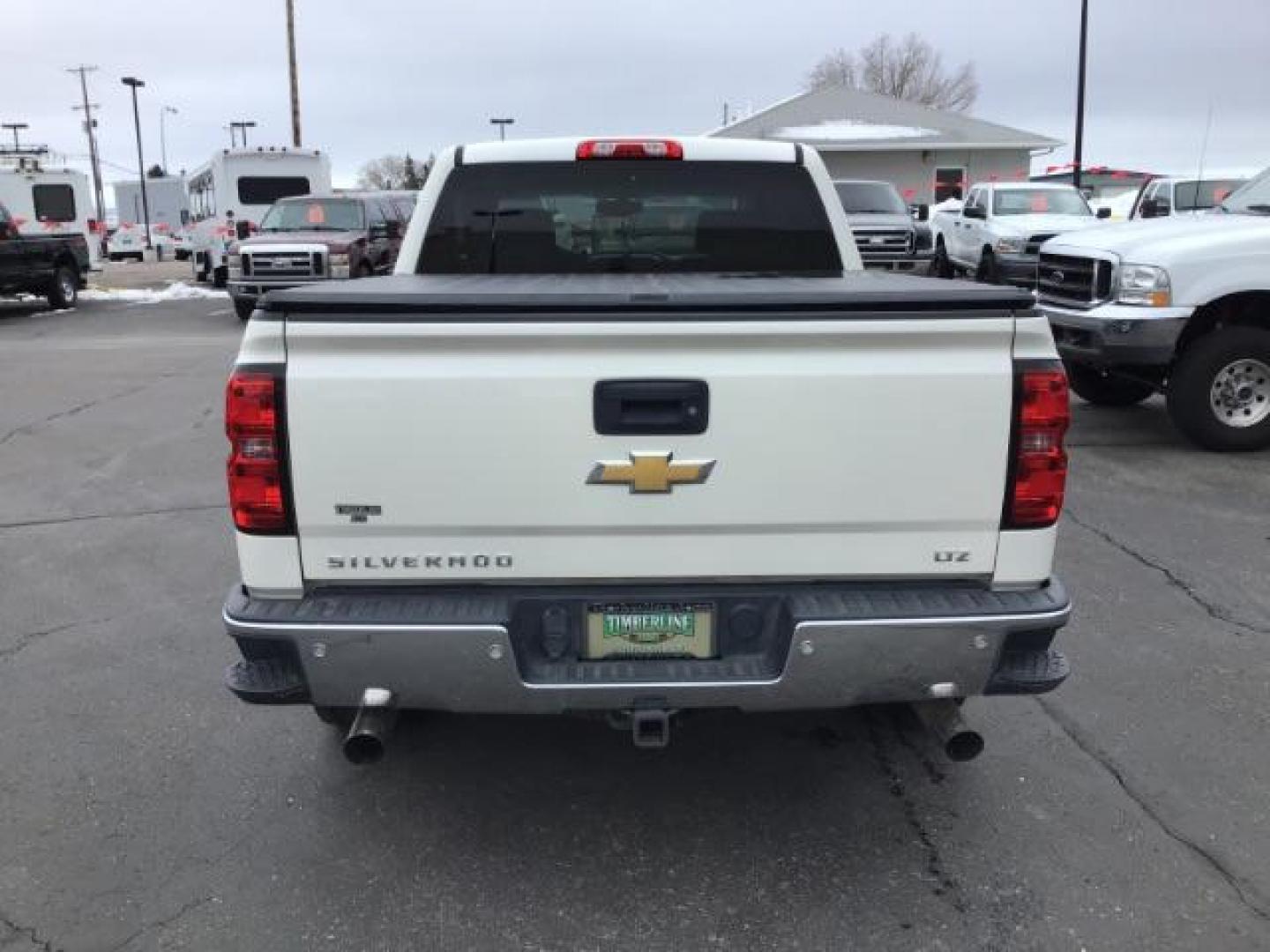 2014 White Diamond Tricoat /Jet Black Chevrolet Silverado 1500 LTZ CREWCAB (3GCUKSEC2EG) with an 5.3L V8 OHV 16V engine, 6-Speed Automatic transmission, located at 1235 N Woodruff Ave., Idaho Falls, 83401, (208) 523-1053, 43.507172, -112.000488 - This 2014 Chevrolet 1500 LTZ 4x4, has the 5.3L motor. It has 117,000 miles. It comes with leather interior, heated seats, blue tooth audio, back up camera, Bose sound system, power seats, and power windows and locks. At Timberline Auto it is always easy to find a great deal on your next vehicle! Our - Photo#3