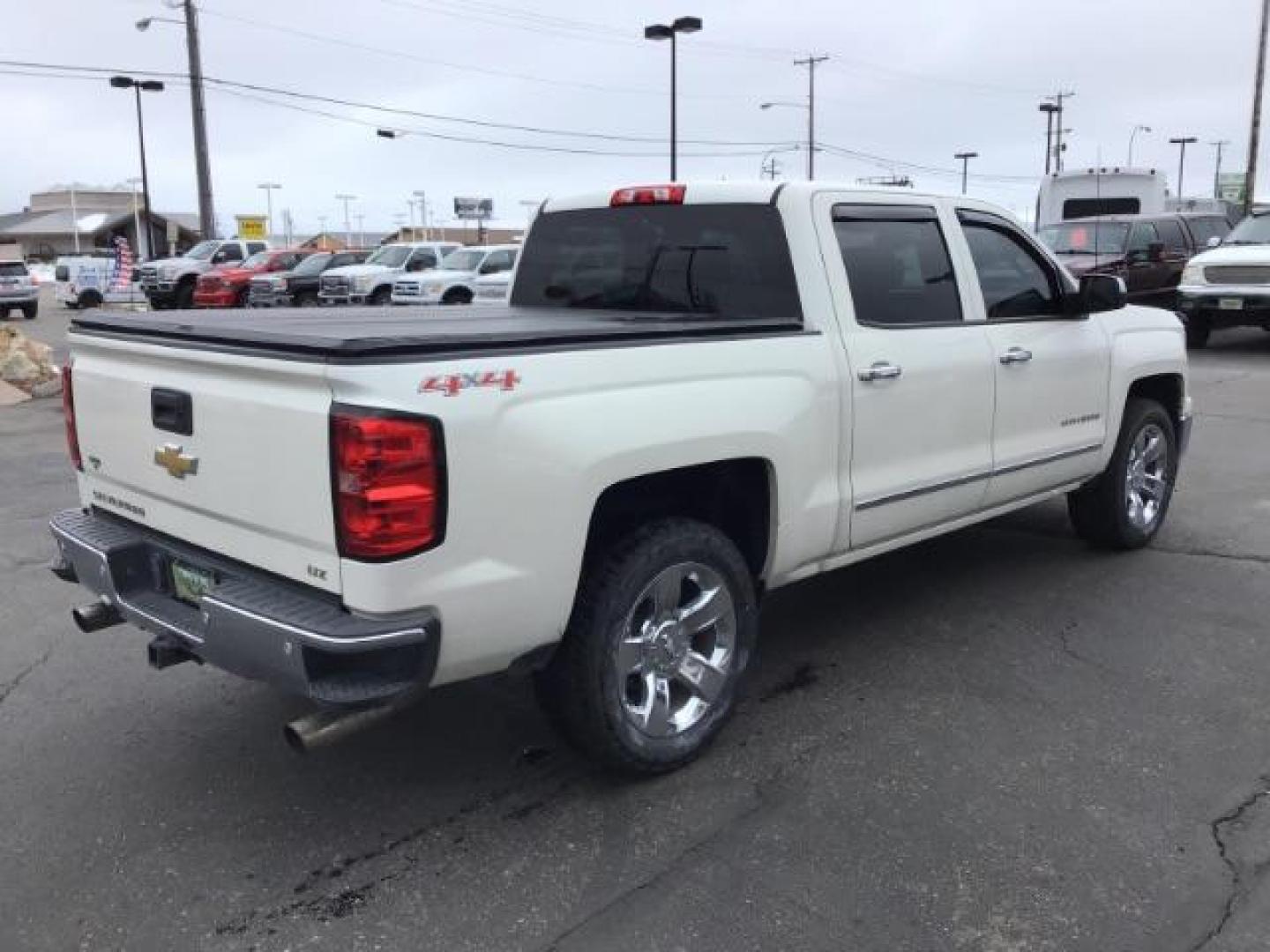 2014 White Diamond Tricoat /Jet Black Chevrolet Silverado 1500 LTZ CREWCAB (3GCUKSEC2EG) with an 5.3L V8 OHV 16V engine, 6-Speed Automatic transmission, located at 1235 N Woodruff Ave., Idaho Falls, 83401, (208) 523-1053, 43.507172, -112.000488 - This 2014 Chevrolet 1500 LTZ 4x4, has the 5.3L motor. It has 117,000 miles. It comes with leather interior, heated seats, blue tooth audio, back up camera, Bose sound system, power seats, and power windows and locks. At Timberline Auto it is always easy to find a great deal on your next vehicle! Our - Photo#4