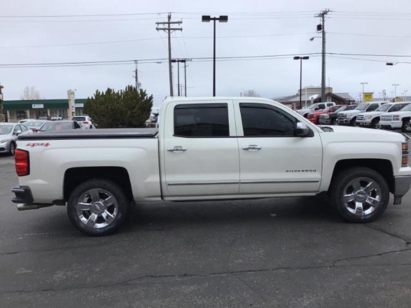 2014 White Diamond Tricoat /Jet Black Chevrolet Silverado 1500 LTZ CREWCAB (3GCUKSEC2EG) with an 5.3L V8 OHV 16V engine, 6-Speed Automatic transmission, located at 1235 N Woodruff Ave., Idaho Falls, 83401, (208) 523-1053, 43.507172, -112.000488 - This 2014 Chevrolet 1500 LTZ 4x4, has the 5.3L motor. It has 117,000 miles. It comes with leather interior, heated seats, blue tooth audio, back up camera, Bose sound system, power seats, and power windows and locks. At Timberline Auto it is always easy to find a great deal on your next vehicle! Our - Photo#5