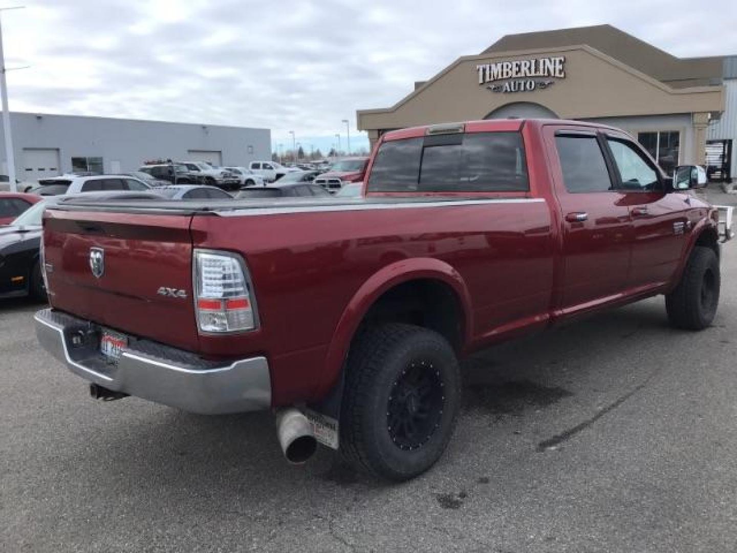 2012 Flame Red /Dark Slate Leather Interior RAM 2500 Laramie Crew Cab LWB 4WD (3C6UD5KLXCG) with an 6.7L L6 OHV 24V TURBO DIESEL engine, MANUAL transmission, located at 1235 N Woodruff Ave., Idaho Falls, 83401, (208) 523-1053, 43.507172, -112.000488 - This 2012 Ram 2500 Laramie, has the 6.7L diesel. It has a manual transmission. It has 118,000 miles. It is a local trade in. It comes with leather interior, heated seats, dual power seats, power lock and windows. At Timberline Auto it is always easy to find a great deal on your next vehicle! Our e - Photo#4