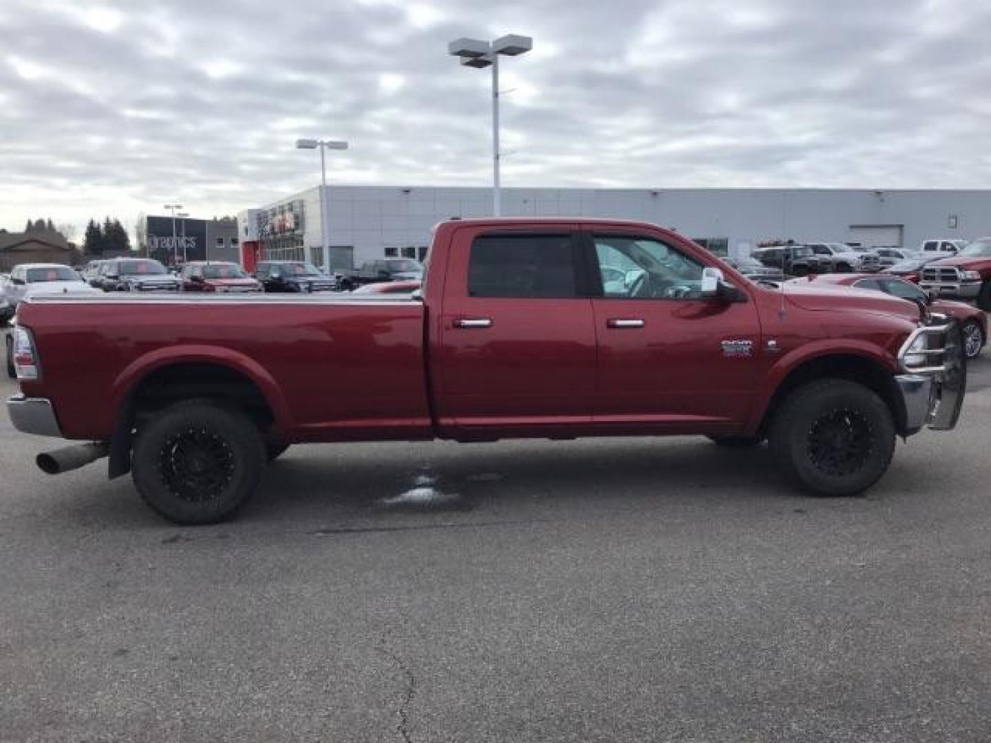 2012 Flame Red /Dark Slate Leather Interior RAM 2500 Laramie Crew Cab LWB 4WD (3C6UD5KLXCG) with an 6.7L L6 OHV 24V TURBO DIESEL engine, MANUAL transmission, located at 1235 N Woodruff Ave., Idaho Falls, 83401, (208) 523-1053, 43.507172, -112.000488 - This 2012 Ram 2500 Laramie, has the 6.7L diesel. It has a manual transmission. It has 118,000 miles. It is a local trade in. It comes with leather interior, heated seats, dual power seats, power lock and windows. At Timberline Auto it is always easy to find a great deal on your next vehicle! Our e - Photo#5