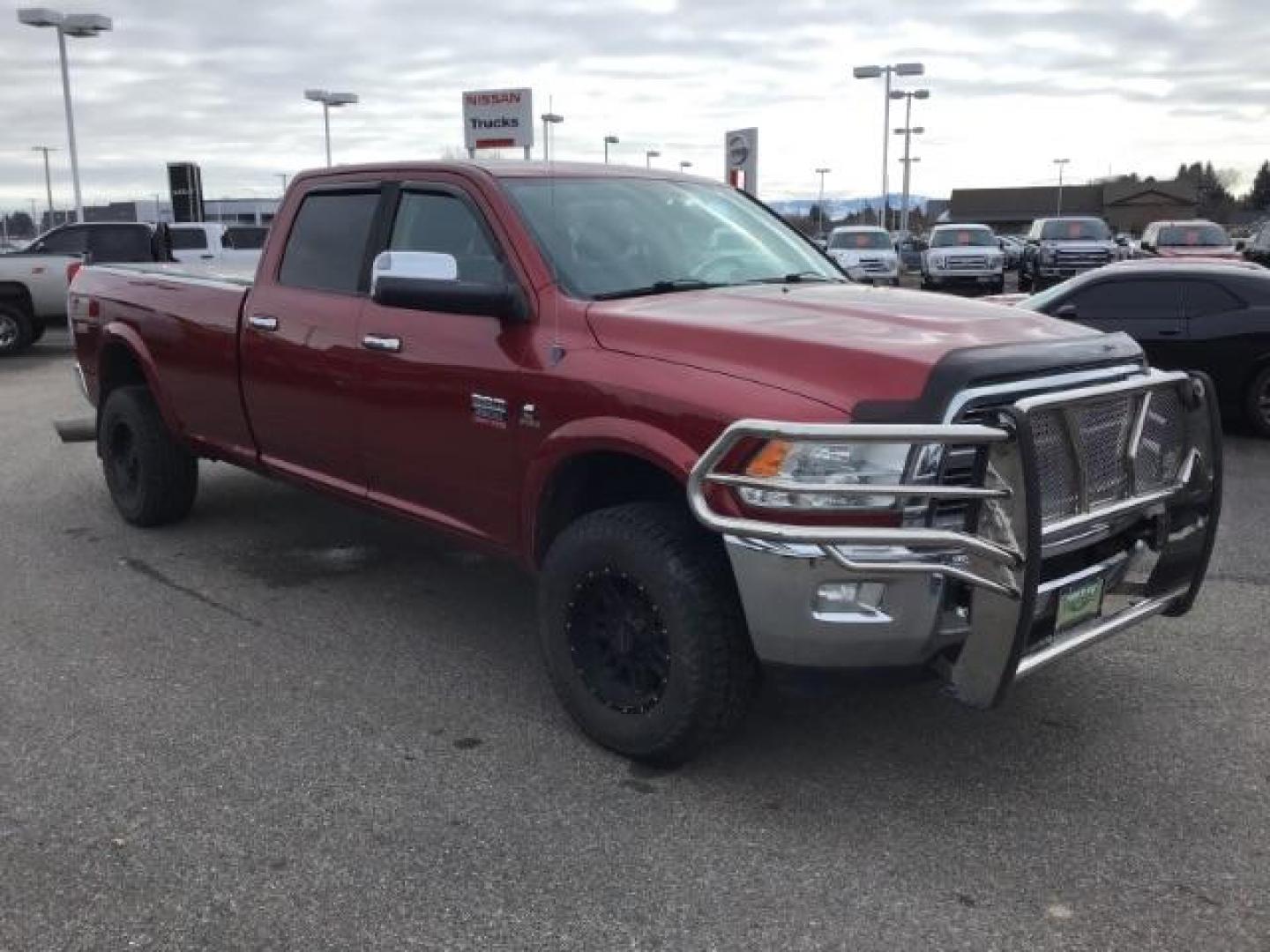 2012 Flame Red /Dark Slate Leather Interior RAM 2500 Laramie Crew Cab LWB 4WD (3C6UD5KLXCG) with an 6.7L L6 OHV 24V TURBO DIESEL engine, MANUAL transmission, located at 1235 N Woodruff Ave., Idaho Falls, 83401, (208) 523-1053, 43.507172, -112.000488 - This 2012 Ram 2500 Laramie, has the 6.7L diesel. It has a manual transmission. It has 118,000 miles. It is a local trade in. It comes with leather interior, heated seats, dual power seats, power lock and windows. At Timberline Auto it is always easy to find a great deal on your next vehicle! Our e - Photo#6