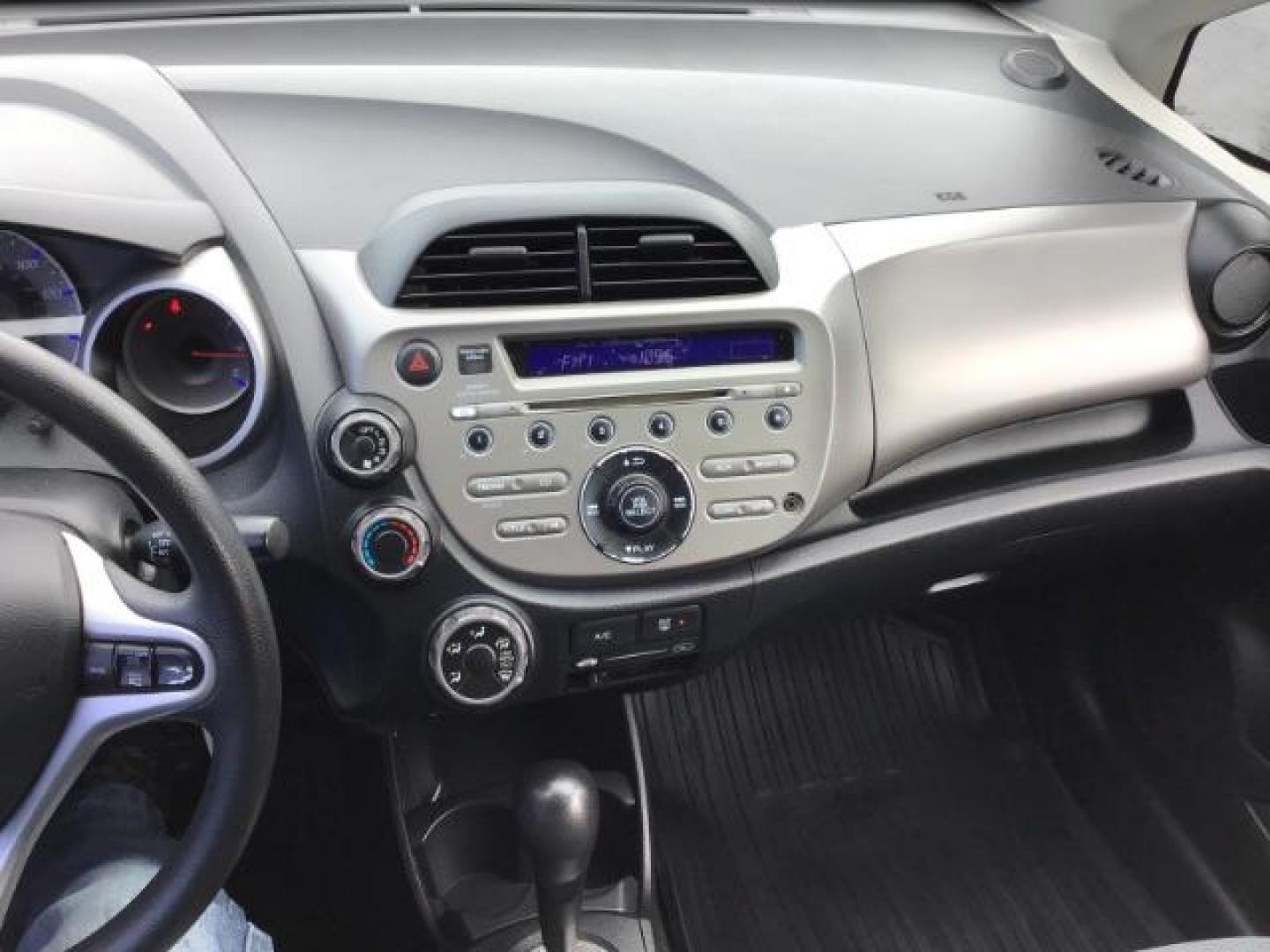 2013 GRAY /Gray Cloth Interior Honda Fit 5-Speed AT (JHMGE8H34DC) with an 1.5L L4 SOHC 16V engine, 5-Speed Automatic transmission, located at 1235 N Woodruff Ave., Idaho Falls, 83401, (208) 523-1053, 43.507172, -112.000488 - This 2013 Honda Fit, has 210,000 miles. It comes with cloth interior, cruise control, power windows, and locks. At Timberline Auto it is always easy to find a great deal on your next vehicle! Our experienced sales staff can help find the right vehicle will fit your needs. Our knowledgeable finance d - Photo#9