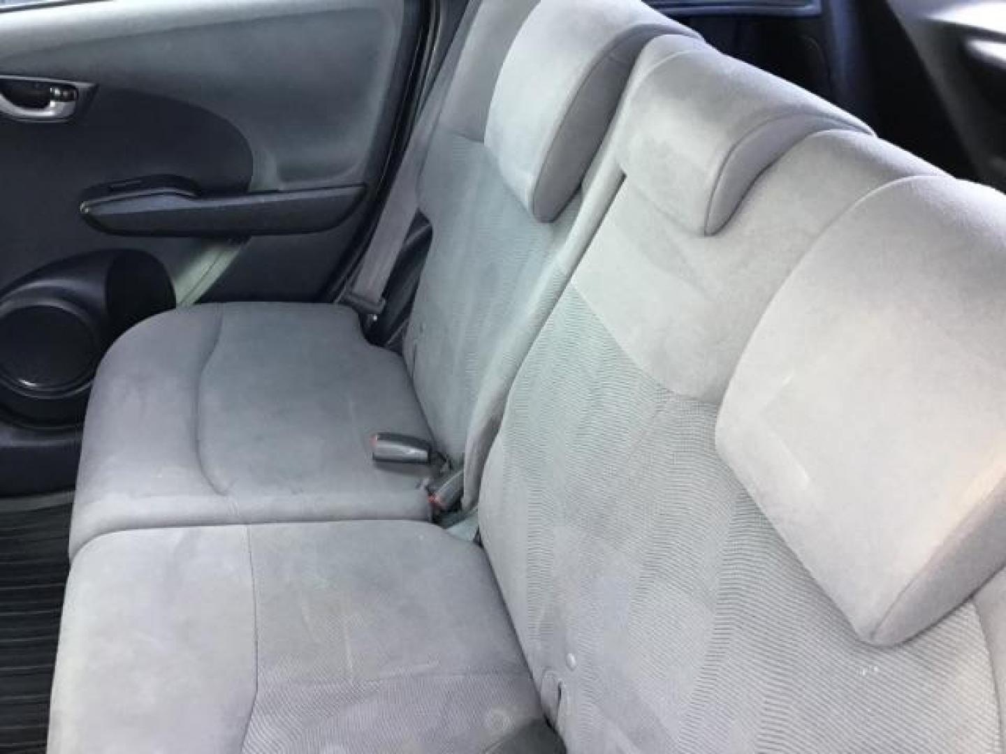 2013 GRAY /Gray Cloth Interior Honda Fit 5-Speed AT (JHMGE8H34DC) with an 1.5L L4 SOHC 16V engine, 5-Speed Automatic transmission, located at 1235 N Woodruff Ave., Idaho Falls, 83401, (208) 523-1053, 43.507172, -112.000488 - This 2013 Honda Fit, has 210,000 miles. It comes with cloth interior, cruise control, power windows, and locks. At Timberline Auto it is always easy to find a great deal on your next vehicle! Our experienced sales staff can help find the right vehicle will fit your needs. Our knowledgeable finance d - Photo#13