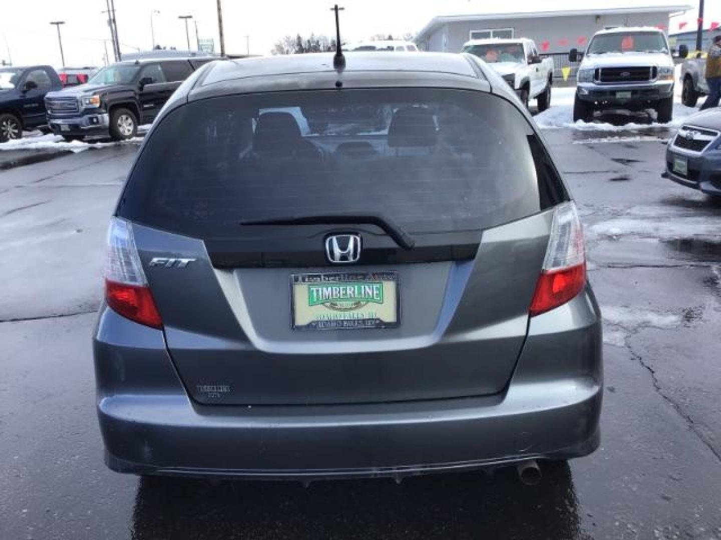 2013 GRAY /Gray Cloth Interior Honda Fit 5-Speed AT (JHMGE8H34DC) with an 1.5L L4 SOHC 16V engine, 5-Speed Automatic transmission, located at 1235 N Woodruff Ave., Idaho Falls, 83401, (208) 523-1053, 43.507172, -112.000488 - This 2013 Honda Fit, has 210,000 miles. It comes with cloth interior, cruise control, power windows, and locks. At Timberline Auto it is always easy to find a great deal on your next vehicle! Our experienced sales staff can help find the right vehicle will fit your needs. Our knowledgeable finance d - Photo#3