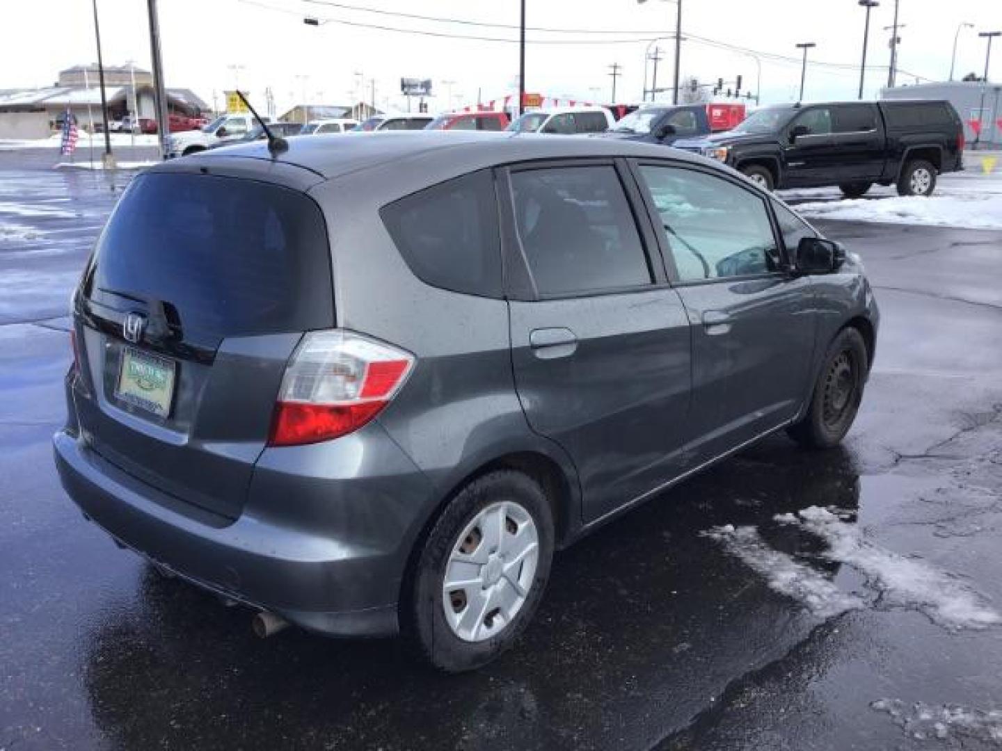 2013 GRAY /Gray Cloth Interior Honda Fit 5-Speed AT (JHMGE8H34DC) with an 1.5L L4 SOHC 16V engine, 5-Speed Automatic transmission, located at 1235 N Woodruff Ave., Idaho Falls, 83401, (208) 523-1053, 43.507172, -112.000488 - This 2013 Honda Fit, has 210,000 miles. It comes with cloth interior, cruise control, power windows, and locks. At Timberline Auto it is always easy to find a great deal on your next vehicle! Our experienced sales staff can help find the right vehicle will fit your needs. Our knowledgeable finance d - Photo#4