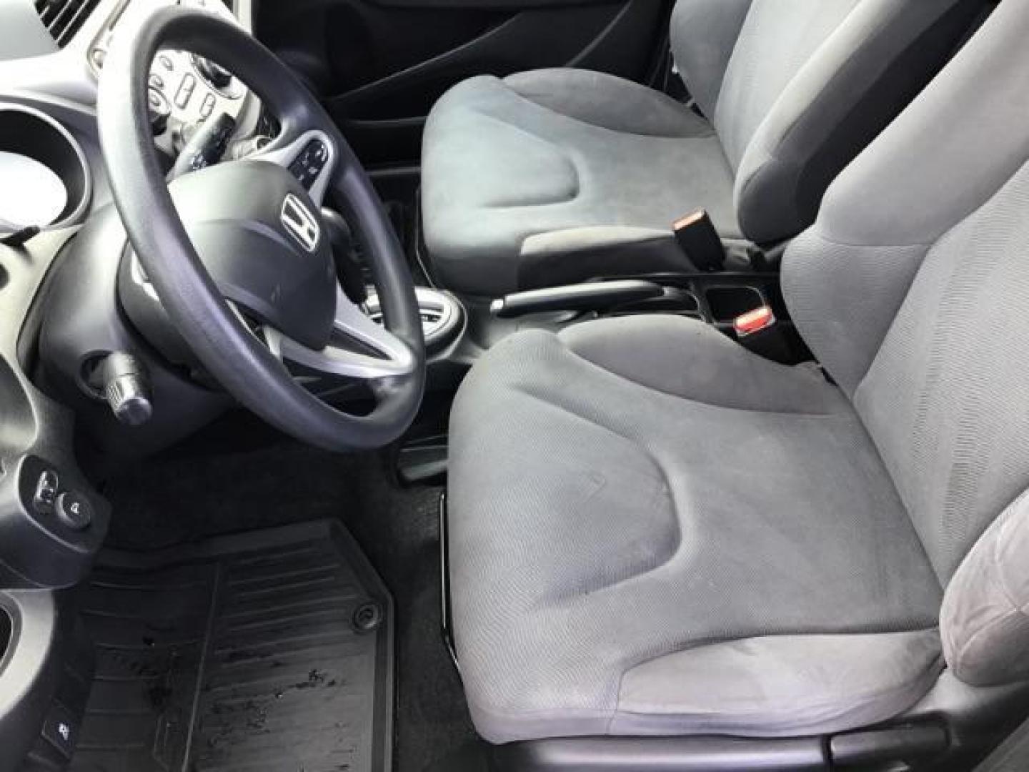 2013 GRAY /Gray Cloth Interior Honda Fit 5-Speed AT (JHMGE8H34DC) with an 1.5L L4 SOHC 16V engine, 5-Speed Automatic transmission, located at 1235 N Woodruff Ave., Idaho Falls, 83401, (208) 523-1053, 43.507172, -112.000488 - This 2013 Honda Fit, has 210,000 miles. It comes with cloth interior, cruise control, power windows, and locks. At Timberline Auto it is always easy to find a great deal on your next vehicle! Our experienced sales staff can help find the right vehicle will fit your needs. Our knowledgeable finance d - Photo#7