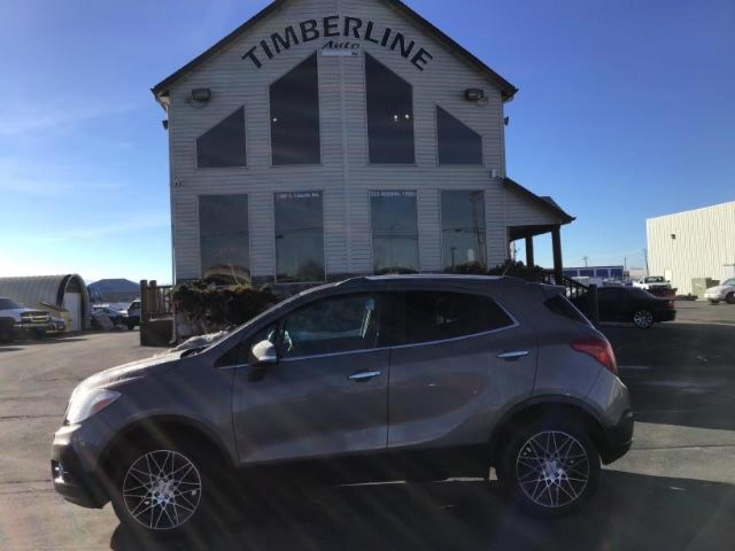 2014 Stain Steel Gray Metallic Buick Encore Premium AWD (KL4CJHSB6EB) with an 1.4L L4 DOHC 16V TURBO engine, 6-Speed Automatic transmission, located at 1235 N Woodruff Ave., Idaho Falls, 83401, (208) 523-1053, 43.507172, -112.000488 - This 2014 Buick Encore Premium AWD, has 100,000 miles. Comes with leather interior, heated seats, back up camera, power seats, power locks and doors. At Timberline Auto it is always easy to find a great deal on your next vehicle! Our experienced sales staff can help find the right vehicle will fit y - Photo#1