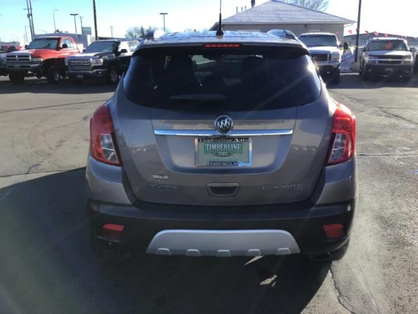 2014 Stain Steel Gray Metallic Buick Encore Premium AWD (KL4CJHSB6EB) with an 1.4L L4 DOHC 16V TURBO engine, 6-Speed Automatic transmission, located at 1235 N Woodruff Ave., Idaho Falls, 83401, (208) 523-1053, 43.507172, -112.000488 - This 2014 Buick Encore Premium AWD, has 100,000 miles. Comes with leather interior, heated seats, back up camera, power seats, power locks and doors. At Timberline Auto it is always easy to find a great deal on your next vehicle! Our experienced sales staff can help find the right vehicle will fit y - Photo#3