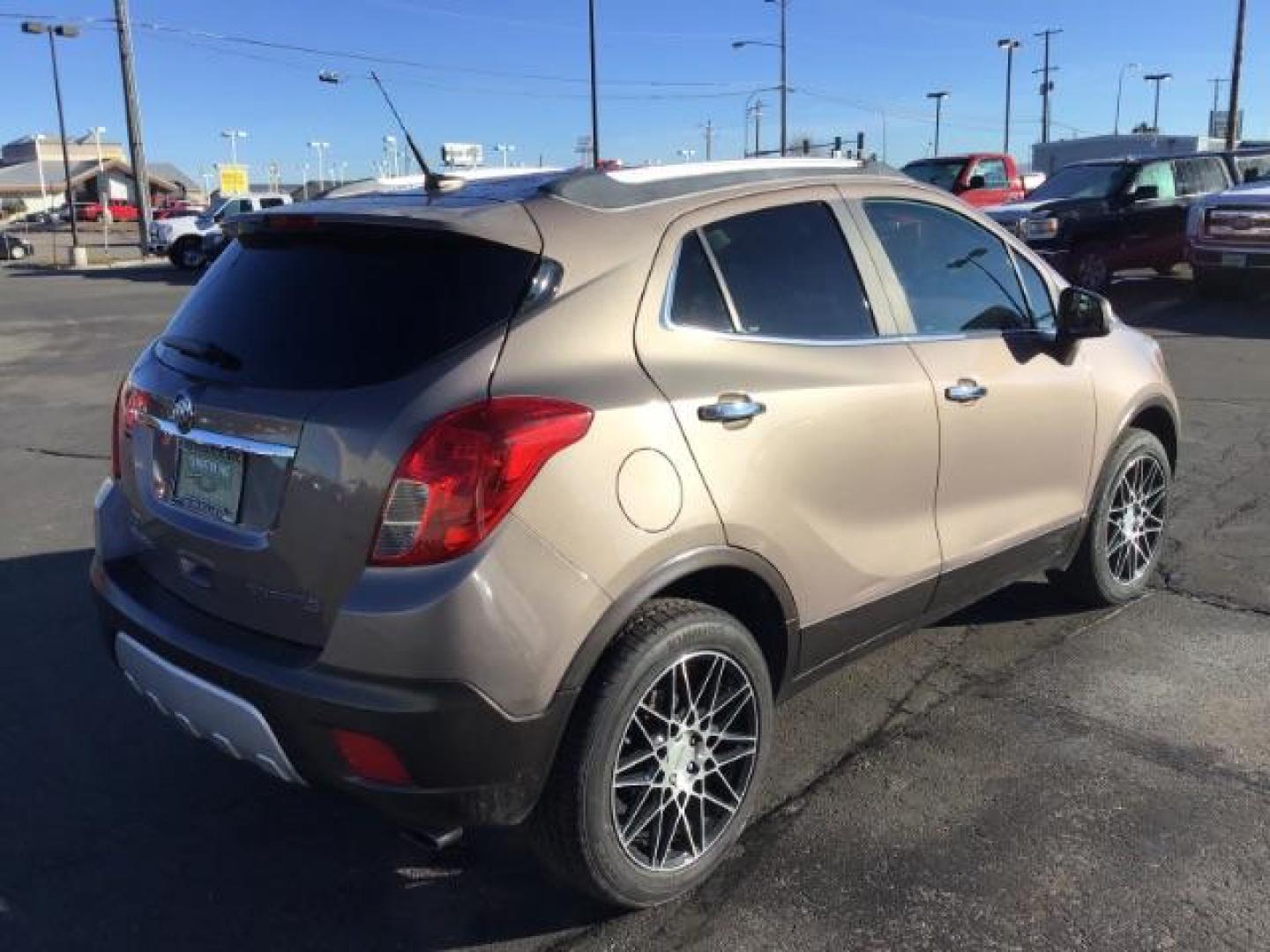 2014 Stain Steel Gray Metallic Buick Encore Premium AWD (KL4CJHSB6EB) with an 1.4L L4 DOHC 16V TURBO engine, 6-Speed Automatic transmission, located at 1235 N Woodruff Ave., Idaho Falls, 83401, (208) 523-1053, 43.507172, -112.000488 - This 2014 Buick Encore Premium AWD, has 100,000 miles. Comes with leather interior, heated seats, back up camera, power seats, power locks and doors. At Timberline Auto it is always easy to find a great deal on your next vehicle! Our experienced sales staff can help find the right vehicle will fit y - Photo#4