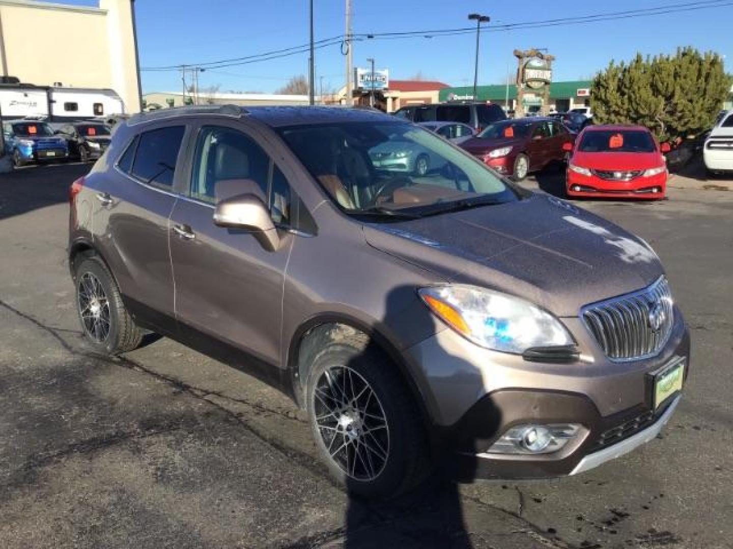 2014 Stain Steel Gray Metallic Buick Encore Premium AWD (KL4CJHSB6EB) with an 1.4L L4 DOHC 16V TURBO engine, 6-Speed Automatic transmission, located at 1235 N Woodruff Ave., Idaho Falls, 83401, (208) 523-1053, 43.507172, -112.000488 - This 2014 Buick Encore Premium AWD, has 100,000 miles. Comes with leather interior, heated seats, back up camera, power seats, power locks and doors. At Timberline Auto it is always easy to find a great deal on your next vehicle! Our experienced sales staff can help find the right vehicle will fit y - Photo#6