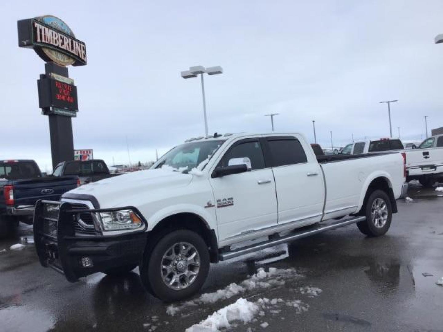 2017 Pearl White /Black/Cattle Tan, premium leather RAM 3500 Longhorn Crew Cab LWB 4WD (3C63R3KL4HG) with an 6.7L L6 OHV 24V TURBO DIESEL engine, 6-Speed Automatic transmission, located at 1235 N Woodruff Ave., Idaho Falls, 83401, (208) 523-1053, 43.507172, -112.000488 - This 2017 Ram 3500 Limited 4x4, has the 6.7L diesel motor. It has 99,000 miles. Comes with leather interior, heated and cooled seats, dual power seats, custom front bumper, back up camera, turnover ball, and blue tooth audio. At Timberline Auto it is always easy to find a great deal on your next ve - Photo#0