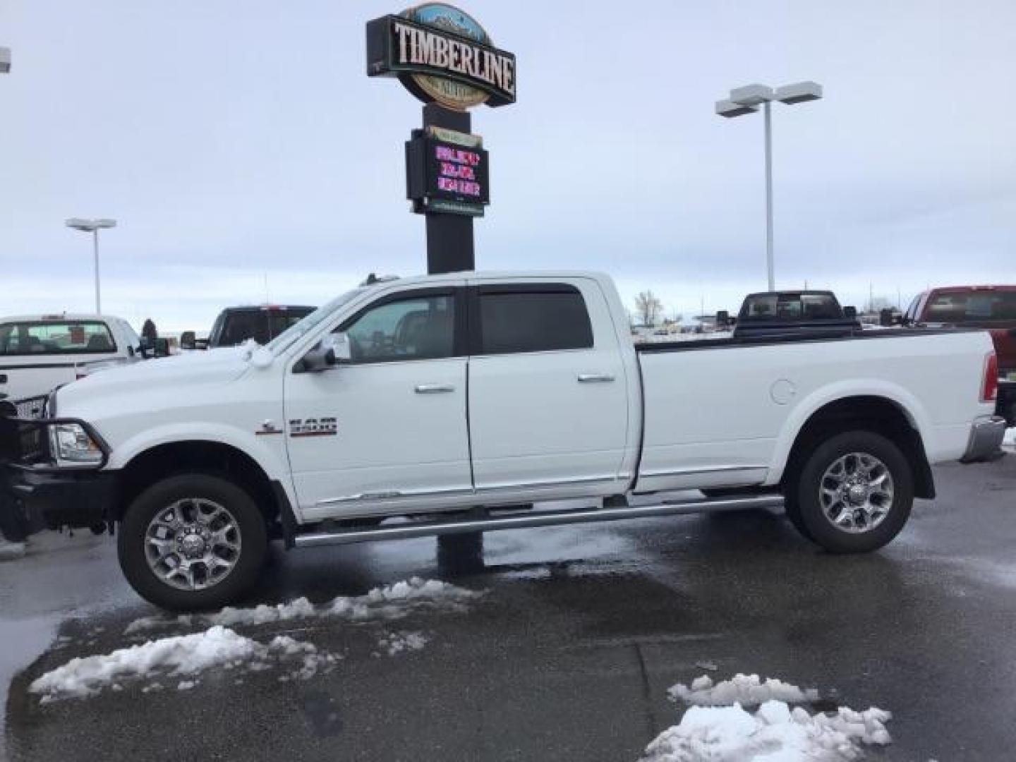 2017 Pearl White /Black/Cattle Tan, premium leather RAM 3500 Longhorn Crew Cab LWB 4WD (3C63R3KL4HG) with an 6.7L L6 OHV 24V TURBO DIESEL engine, 6-Speed Automatic transmission, located at 1235 N Woodruff Ave., Idaho Falls, 83401, (208) 523-1053, 43.507172, -112.000488 - This 2017 Ram 3500 Limited 4x4, has the 6.7L diesel motor. It has 99,000 miles. Comes with leather interior, heated and cooled seats, dual power seats, custom front bumper, back up camera, turnover ball, and blue tooth audio. At Timberline Auto it is always easy to find a great deal on your next ve - Photo#1