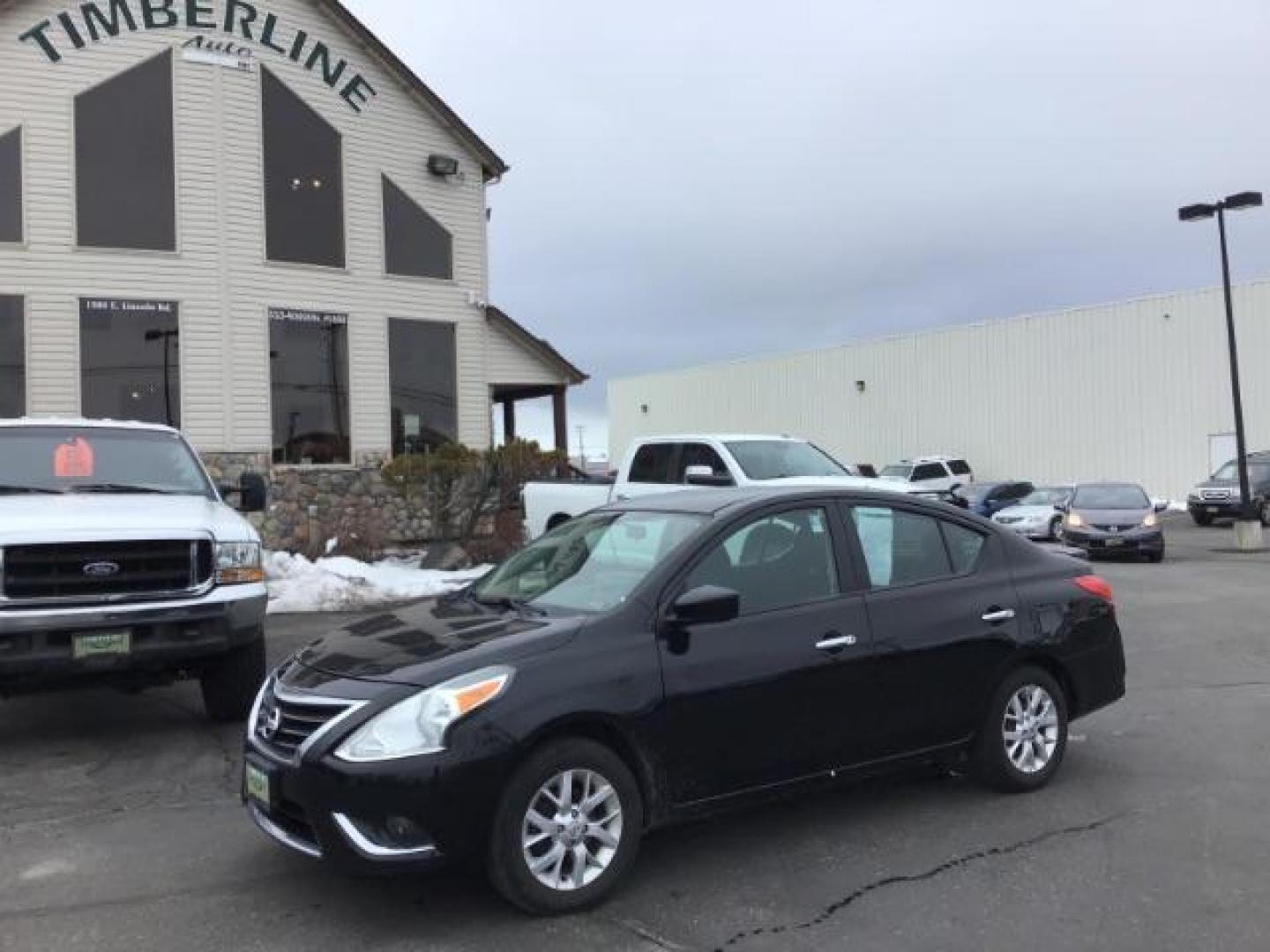 2018 Super Black /Charcoal, premium cloth Nissan Versa 1.6 SV Sedan (3N1CN7AP7JL) with an 1.6L L4 DOHC 16V engine, Continuously Variable Transmission transmission, located at 1235 N Woodruff Ave., Idaho Falls, 83401, (208) 523-1053, 43.507172, -112.000488 - This 2018 Nissan Versa SV, has 70,000 miles. Comes with cloth interior, back up camera, cruise control, blue tooth audio, power windows, and locks. At Timberline Auto it is always easy to find a great deal on your next vehicle! Our experienced sales staff can help find the right vehicle will fit you - Photo#0