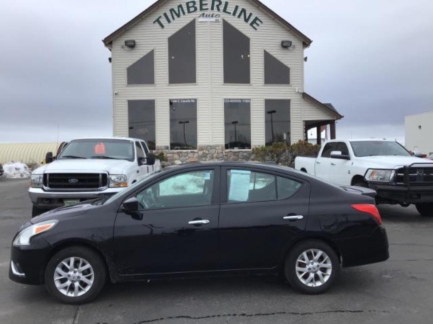 2018 Super Black /Charcoal, premium cloth Nissan Versa 1.6 SV Sedan (3N1CN7AP7JL) with an 1.6L L4 DOHC 16V engine, Continuously Variable Transmission transmission, located at 1235 N Woodruff Ave., Idaho Falls, 83401, (208) 523-1053, 43.507172, -112.000488 - This 2018 Nissan Versa SV, has 70,000 miles. Comes with cloth interior, back up camera, cruise control, blue tooth audio, power windows, and locks. At Timberline Auto it is always easy to find a great deal on your next vehicle! Our experienced sales staff can help find the right vehicle will fit you - Photo#1