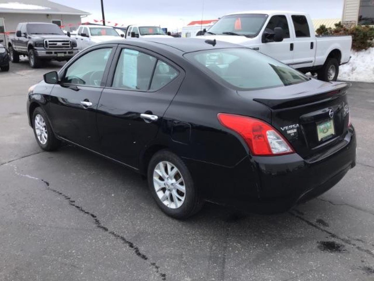 2018 Super Black /Charcoal, premium cloth Nissan Versa 1.6 SV Sedan (3N1CN7AP7JL) with an 1.6L L4 DOHC 16V engine, Continuously Variable Transmission transmission, located at 1235 N Woodruff Ave., Idaho Falls, 83401, (208) 523-1053, 43.507172, -112.000488 - This 2018 Nissan Versa SV, has 70,000 miles. Comes with cloth interior, back up camera, cruise control, blue tooth audio, power windows, and locks. At Timberline Auto it is always easy to find a great deal on your next vehicle! Our experienced sales staff can help find the right vehicle will fit you - Photo#2