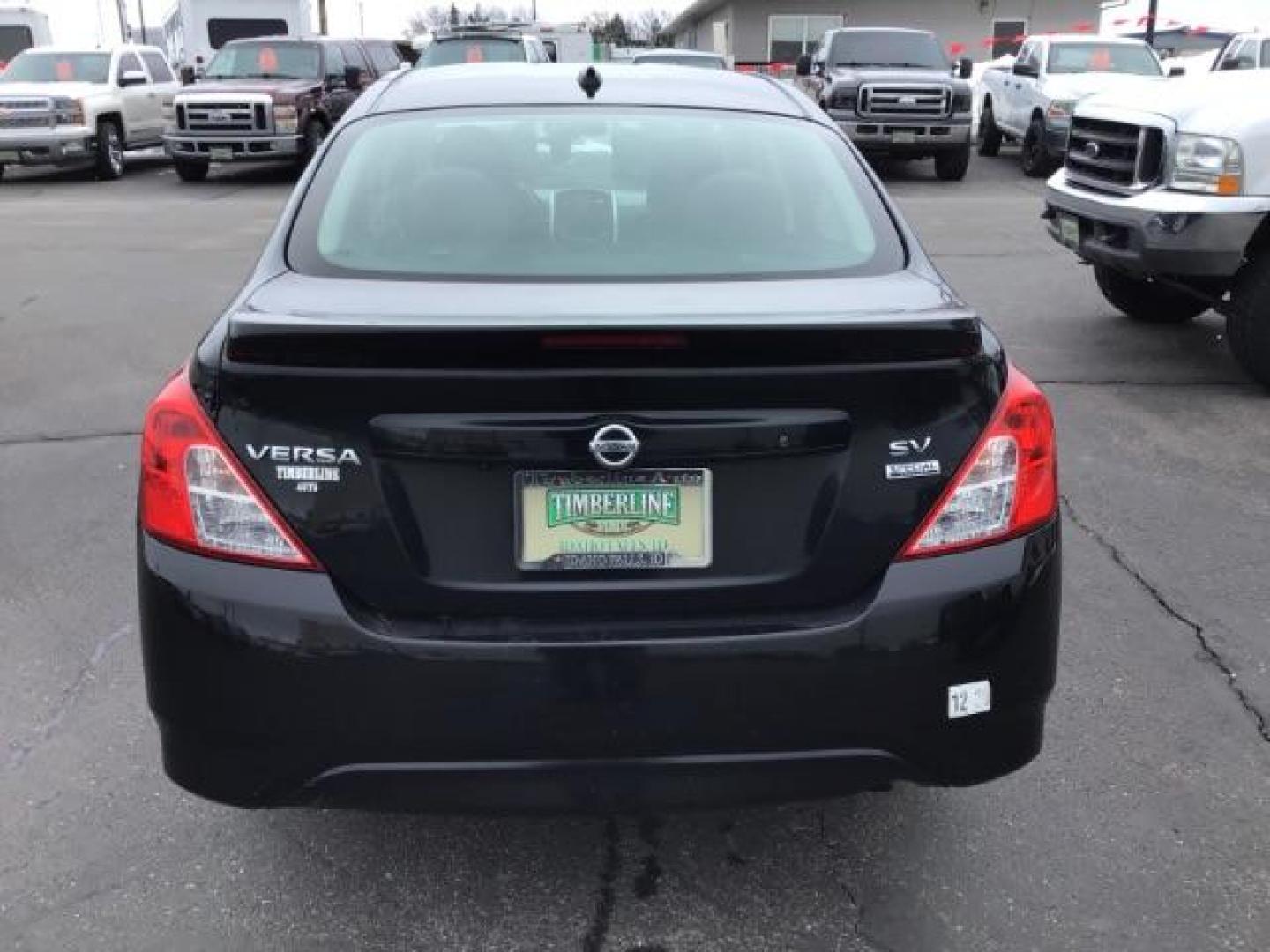 2018 Super Black /Charcoal, premium cloth Nissan Versa 1.6 SV Sedan (3N1CN7AP7JL) with an 1.6L L4 DOHC 16V engine, Continuously Variable Transmission transmission, located at 1235 N Woodruff Ave., Idaho Falls, 83401, (208) 523-1053, 43.507172, -112.000488 - This 2018 Nissan Versa SV, has 70,000 miles. Comes with cloth interior, back up camera, cruise control, blue tooth audio, power windows, and locks. At Timberline Auto it is always easy to find a great deal on your next vehicle! Our experienced sales staff can help find the right vehicle will fit you - Photo#3