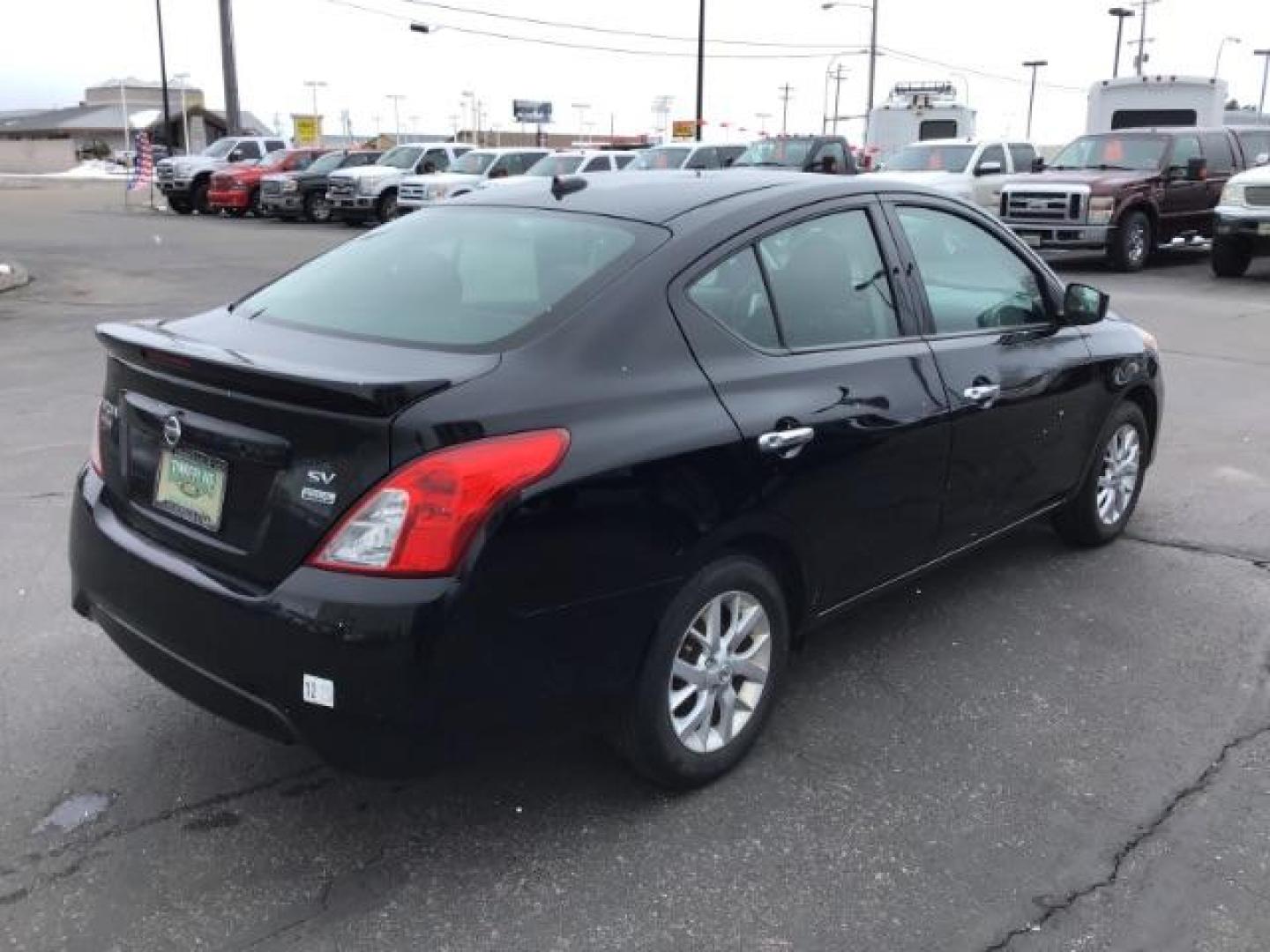 2018 Super Black /Charcoal, premium cloth Nissan Versa 1.6 SV Sedan (3N1CN7AP7JL) with an 1.6L L4 DOHC 16V engine, Continuously Variable Transmission transmission, located at 1235 N Woodruff Ave., Idaho Falls, 83401, (208) 523-1053, 43.507172, -112.000488 - This 2018 Nissan Versa SV, has 70,000 miles. Comes with cloth interior, back up camera, cruise control, blue tooth audio, power windows, and locks. At Timberline Auto it is always easy to find a great deal on your next vehicle! Our experienced sales staff can help find the right vehicle will fit you - Photo#4