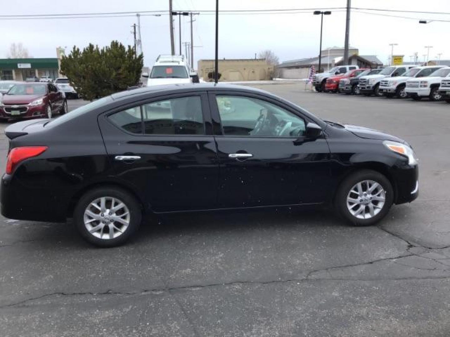 2018 Super Black /Charcoal, premium cloth Nissan Versa 1.6 SV Sedan (3N1CN7AP7JL) with an 1.6L L4 DOHC 16V engine, Continuously Variable Transmission transmission, located at 1235 N Woodruff Ave., Idaho Falls, 83401, (208) 523-1053, 43.507172, -112.000488 - This 2018 Nissan Versa SV, has 70,000 miles. Comes with cloth interior, back up camera, cruise control, blue tooth audio, power windows, and locks. At Timberline Auto it is always easy to find a great deal on your next vehicle! Our experienced sales staff can help find the right vehicle will fit you - Photo#5