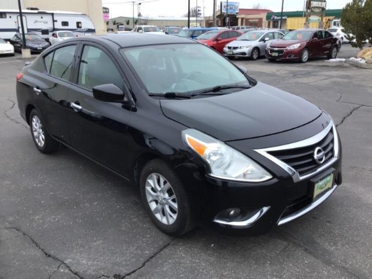 2018 Super Black /Charcoal, premium cloth Nissan Versa 1.6 SV Sedan (3N1CN7AP7JL) with an 1.6L L4 DOHC 16V engine, Continuously Variable Transmission transmission, located at 1235 N Woodruff Ave., Idaho Falls, 83401, (208) 523-1053, 43.507172, -112.000488 - This 2018 Nissan Versa SV, has 70,000 miles. Comes with cloth interior, back up camera, cruise control, blue tooth audio, power windows, and locks. At Timberline Auto it is always easy to find a great deal on your next vehicle! Our experienced sales staff can help find the right vehicle will fit you - Photo#6