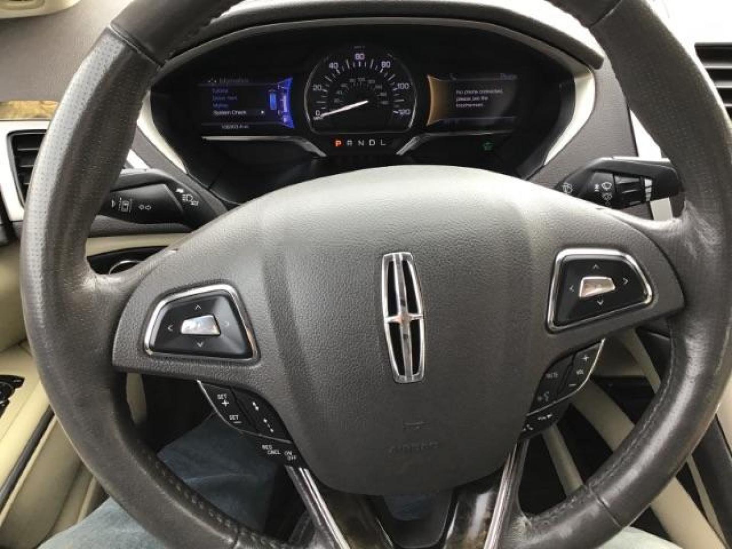 2013 BLUE /Light Dune Lincoln MKZ Hybrid Sedan (3LN6L2LU1DR) with an 2.5L L4 DOHC 16V HYBRID engine, Continuously Variable Transmission transmission, located at 1235 N Woodruff Ave., Idaho Falls, 83401, (208) 523-1053, 43.507172, -112.000488 - This 2013 Lincoln MKZ Hybrid, has 108,000 miles. Comes with leather interior, power seats, power windows, touch screen stereo, heated seats, and sunroof. At Timberline Auto it is always easy to find a great deal on your next vehicle! Our experienced sales staff can help find the right vehicle will f - Photo#13