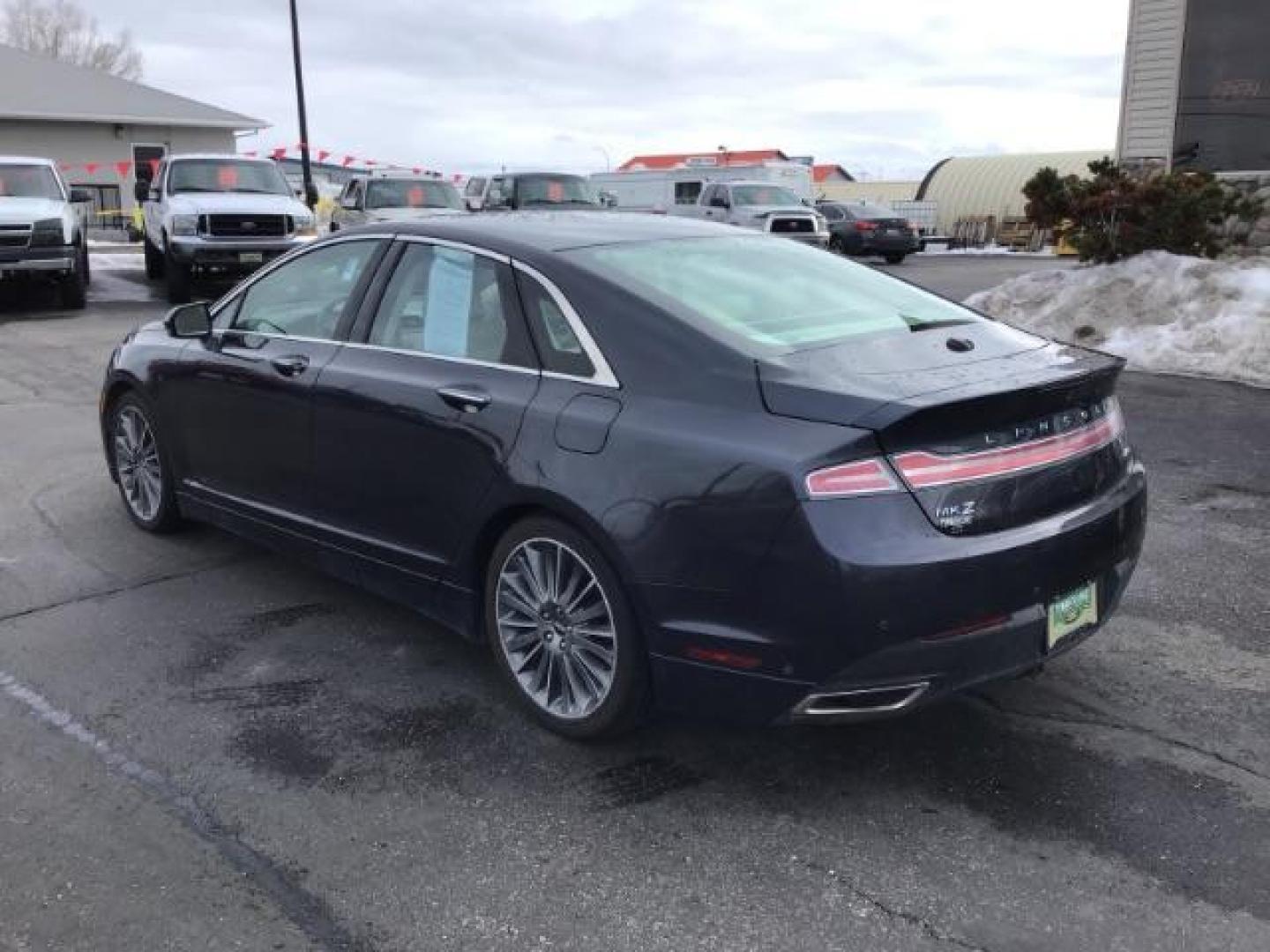 2013 BLUE /Light Dune Lincoln MKZ Hybrid Sedan (3LN6L2LU1DR) with an 2.5L L4 DOHC 16V HYBRID engine, Continuously Variable Transmission transmission, located at 1235 N Woodruff Ave., Idaho Falls, 83401, (208) 523-1053, 43.507172, -112.000488 - This 2013 Lincoln MKZ Hybrid, has 108,000 miles. Comes with leather interior, power seats, power windows, touch screen stereo, heated seats, and sunroof. At Timberline Auto it is always easy to find a great deal on your next vehicle! Our experienced sales staff can help find the right vehicle will f - Photo#2