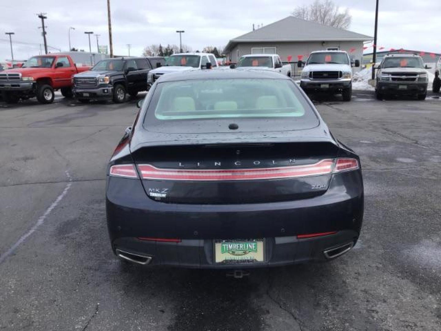 2013 BLUE /Light Dune Lincoln MKZ Hybrid Sedan (3LN6L2LU1DR) with an 2.5L L4 DOHC 16V HYBRID engine, Continuously Variable Transmission transmission, located at 1235 N Woodruff Ave., Idaho Falls, 83401, (208) 523-1053, 43.507172, -112.000488 - This 2013 Lincoln MKZ Hybrid, has 108,000 miles. Comes with leather interior, power seats, power windows, touch screen stereo, heated seats, and sunroof. At Timberline Auto it is always easy to find a great deal on your next vehicle! Our experienced sales staff can help find the right vehicle will f - Photo#3