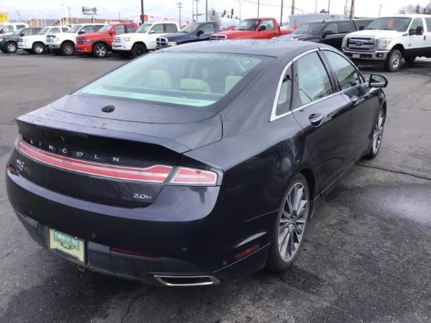 2013 BLUE /Light Dune Lincoln MKZ Hybrid Sedan (3LN6L2LU1DR) with an 2.5L L4 DOHC 16V HYBRID engine, Continuously Variable Transmission transmission, located at 1235 N Woodruff Ave., Idaho Falls, 83401, (208) 523-1053, 43.507172, -112.000488 - This 2013 Lincoln MKZ Hybrid, has 108,000 miles. Comes with leather interior, power seats, power windows, touch screen stereo, heated seats, and sunroof. At Timberline Auto it is always easy to find a great deal on your next vehicle! Our experienced sales staff can help find the right vehicle will f - Photo#4