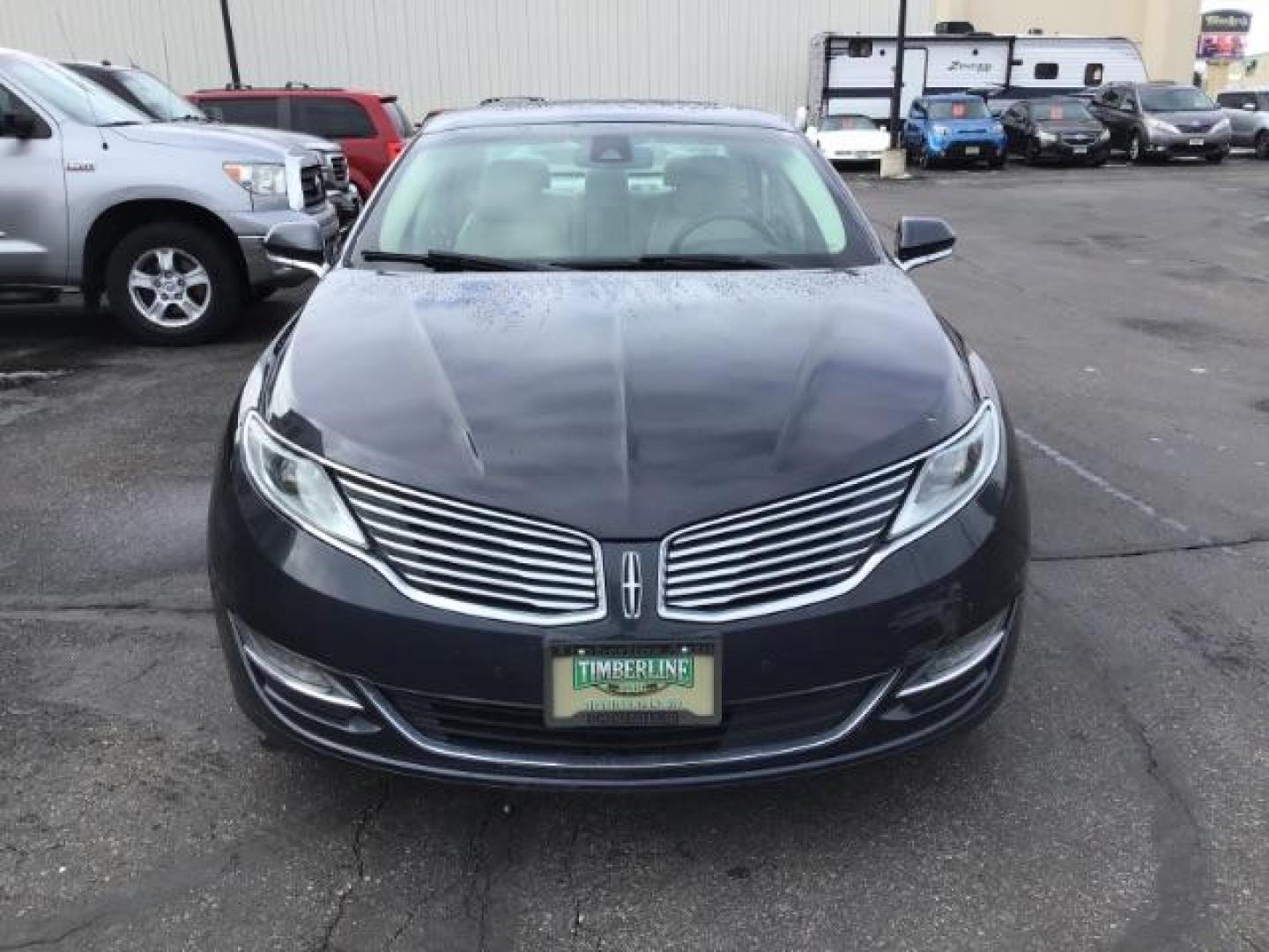 2013 BLUE /Light Dune Lincoln MKZ Hybrid Sedan (3LN6L2LU1DR) with an 2.5L L4 DOHC 16V HYBRID engine, Continuously Variable Transmission transmission, located at 1235 N Woodruff Ave., Idaho Falls, 83401, (208) 523-1053, 43.507172, -112.000488 - This 2013 Lincoln MKZ Hybrid, has 108,000 miles. Comes with leather interior, power seats, power windows, touch screen stereo, heated seats, and sunroof. At Timberline Auto it is always easy to find a great deal on your next vehicle! Our experienced sales staff can help find the right vehicle will f - Photo#7