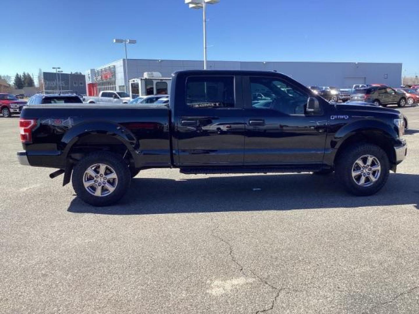 2018 Shadow Black /Medium Earth Gray, vinyl Ford F-150 XLT SuperCrew 6.5-ft. Bed 4WD (1FTFW1EG1JK) with an 3.5 V6 engine, 6-Speed Automatic transmission, located at 1235 N Woodruff Ave., Idaho Falls, 83401, (208) 523-1053, 43.507172, -112.000488 - At Timberline Auto it is always easy to find a great deal on your next vehicle! Our experienced sales staff can help find the right vehicle that will fit your needs. Our knowledgeable finance department has options for almost any credit score. We offer many warranty contract options to protect your - Photo#5