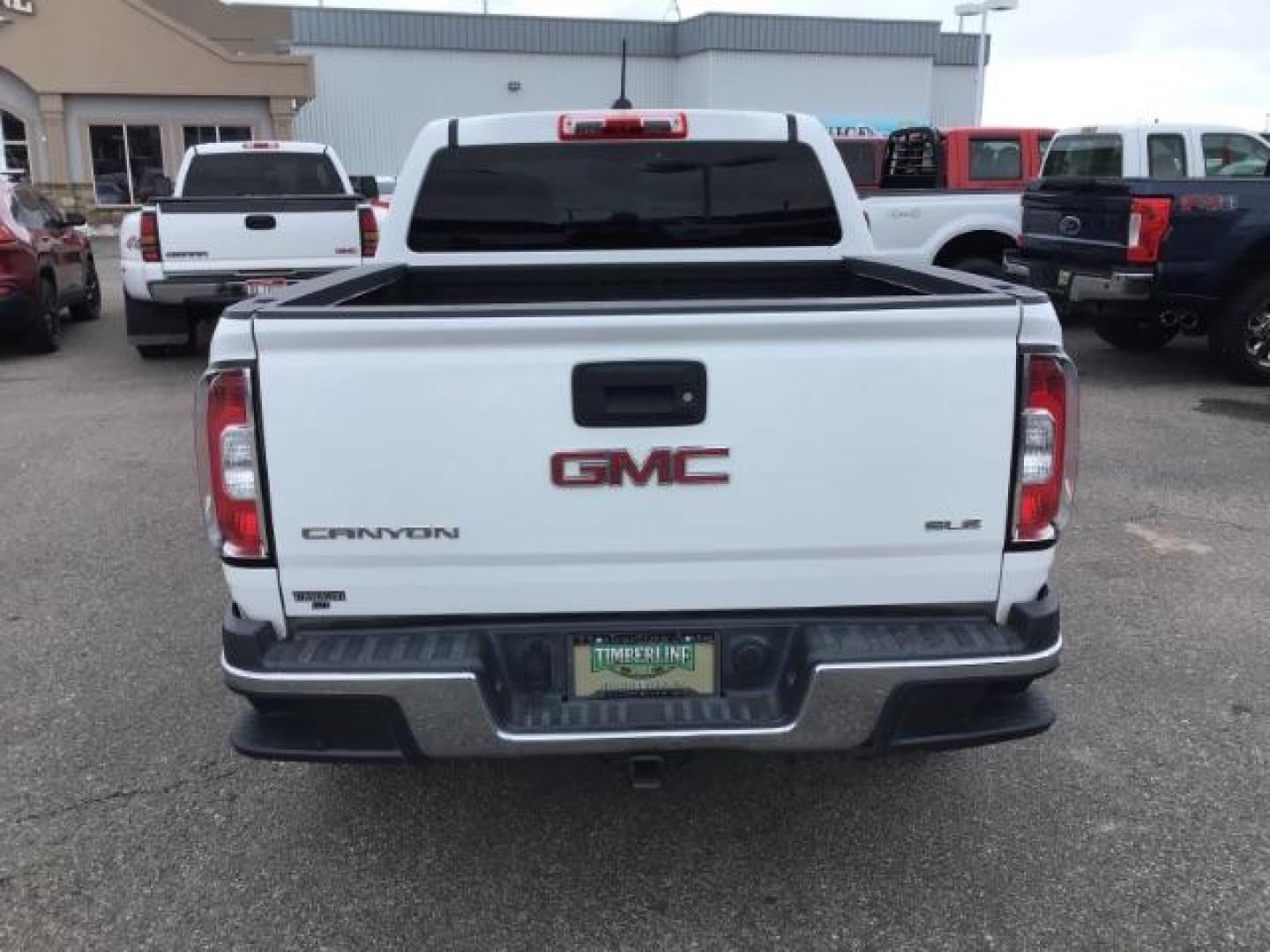 2015 Summit White /Jet Black GMC Canyon SLE Crew Cab 4WD Short Box (1GTG6BE38F1) with an 3.6L V6 DOHC 24V engine, 6-Speed Automatic transmission, located at 1235 N Woodruff Ave., Idaho Falls, 83401, (208) 523-1053, 43.507172, -112.000488 - This 2015 GMC Canyon SLE 4x4, has the 3.6L motor. It has 130,000 miles. Comes with cloth interior, blue tooth audio, back up camera, cruise control, power windows and locks. At Timberline Auto it is always easy to find a great deal on your next vehicle! Our experienced sales staff can help find the - Photo#3